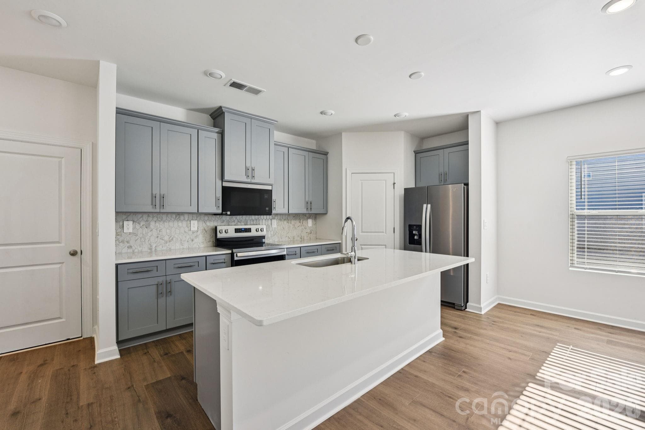 Photo is not of the actual home, but is an inspirational photo of builder’s model home and may depict options, furnishings, and/or decorator features that are not included - 7280 Yardley Street, Gastonia
