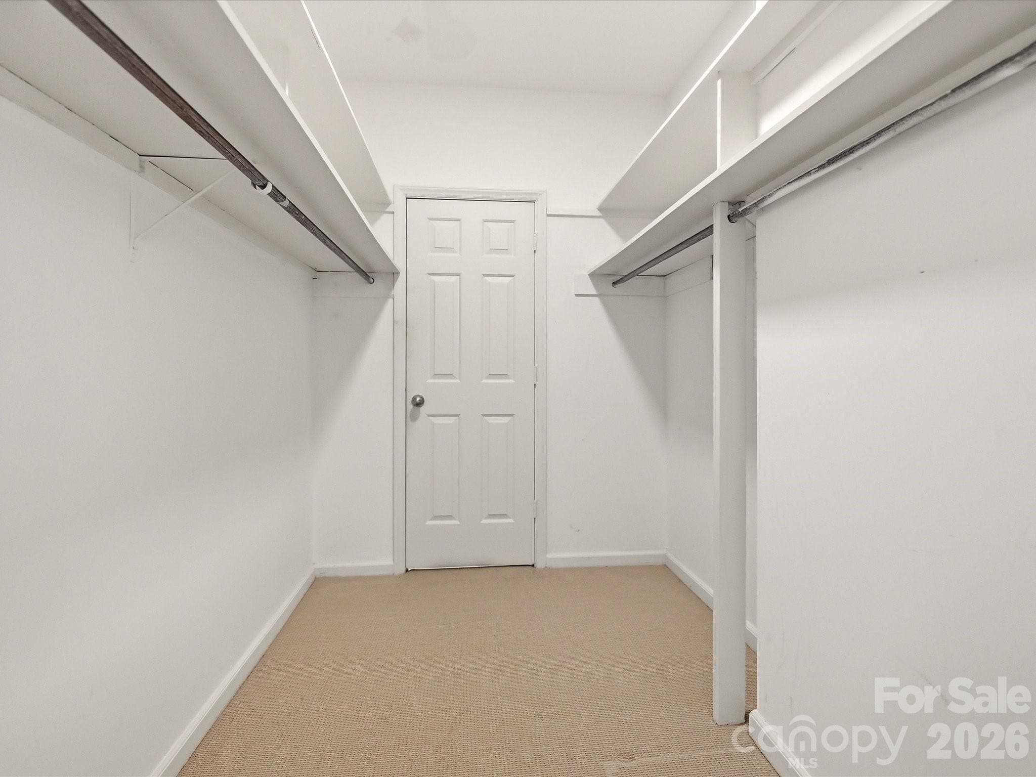 Walk-in closet in third bedroom. - 806 Cherokee Road, Charlotte