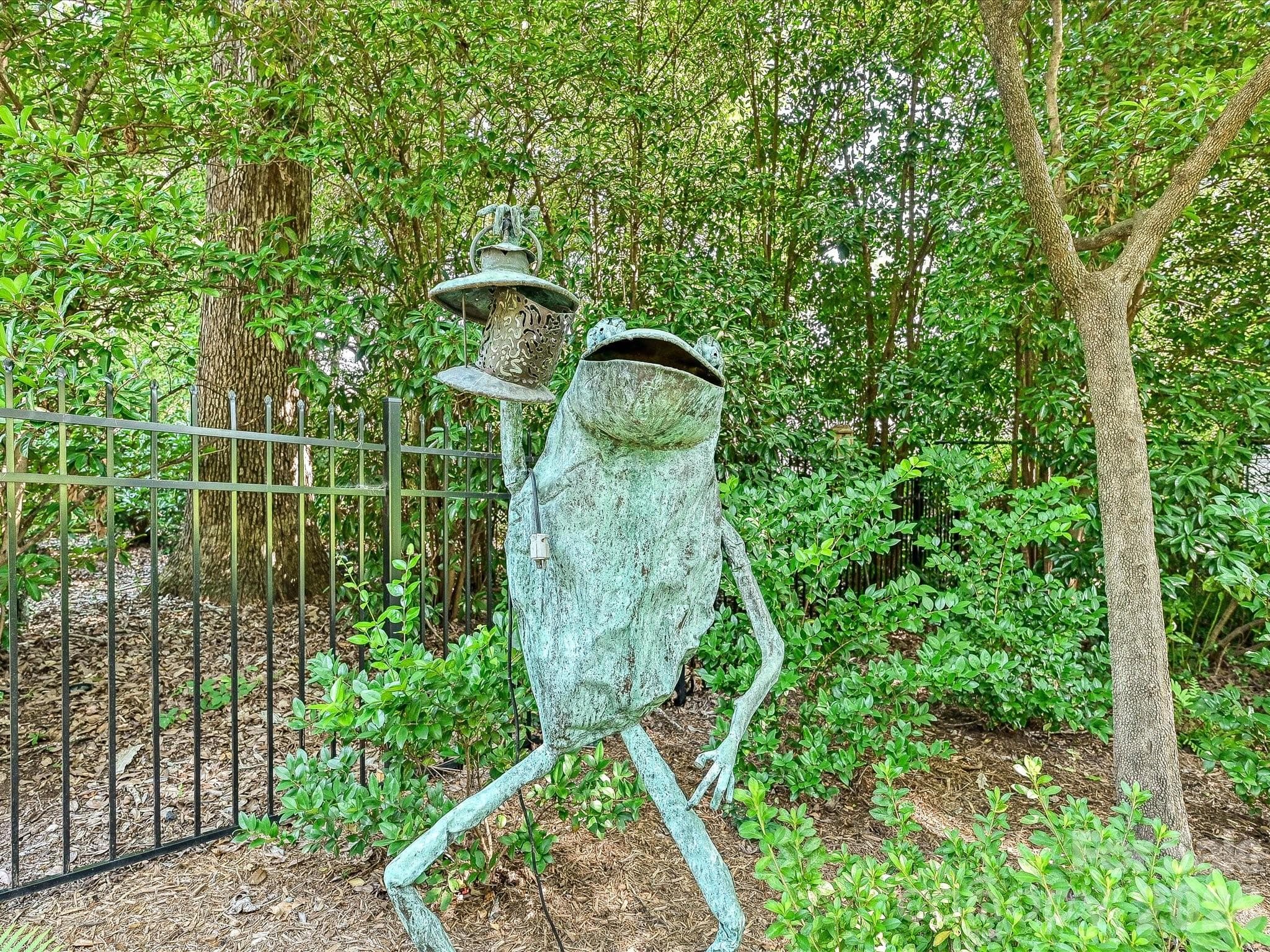 Whimsical artwork in the garden - 806 Cherokee Road, Charlotte