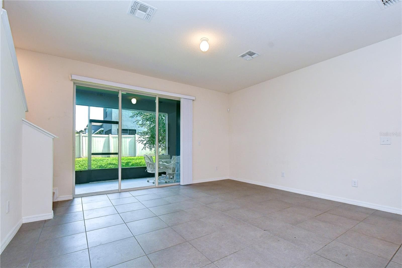 Open layout creates a seamless transition between the main living spaces and outdoor retreat - 3326 PLEASANT WILLOW CT, BRANDON