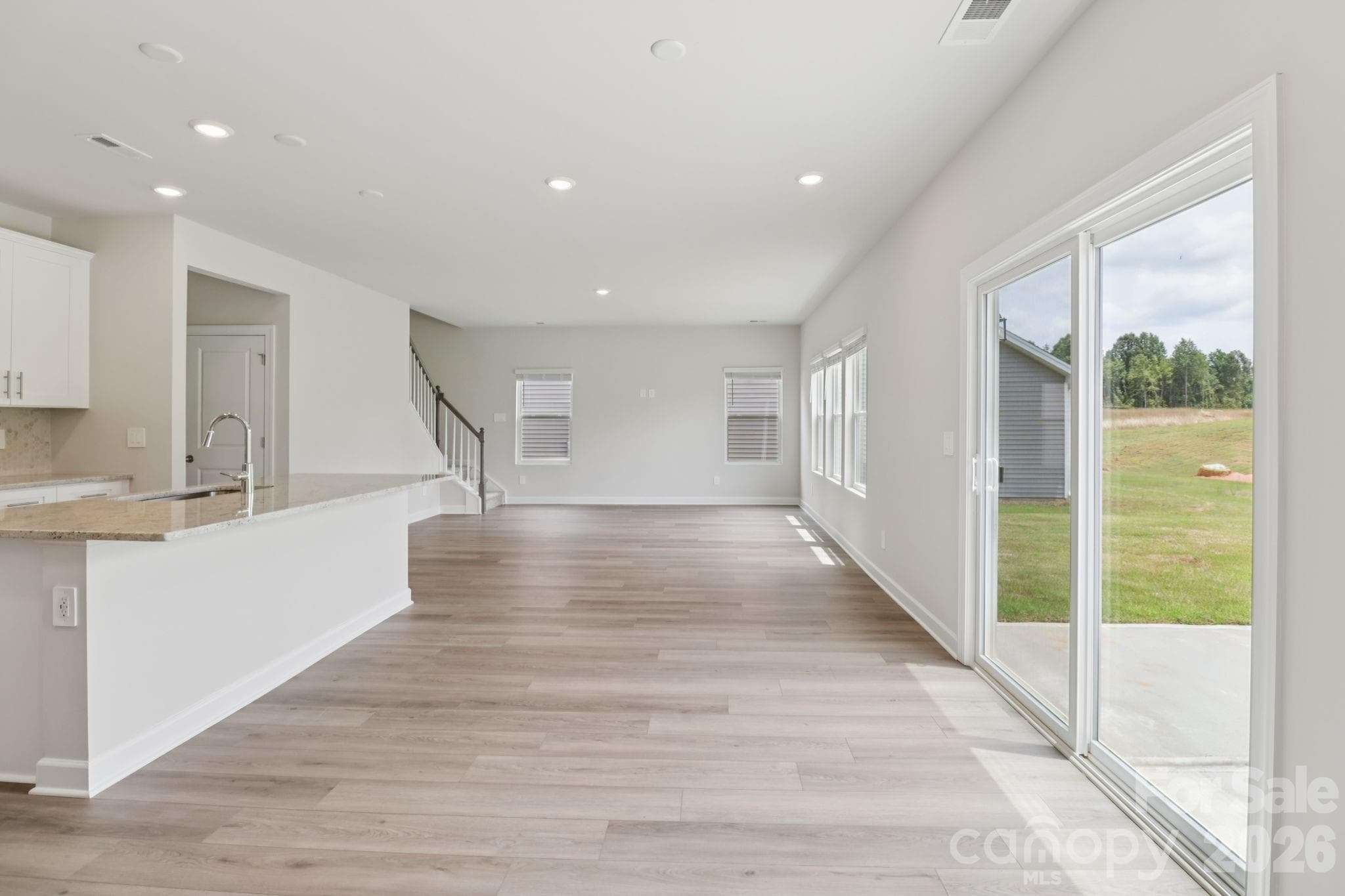 Photo is not of the actual home but is an inspirational photo of builder’s model home and may depict options, furnishings, and/or decorator features that are not included. - 2310 Snapdragon Court, Stanley