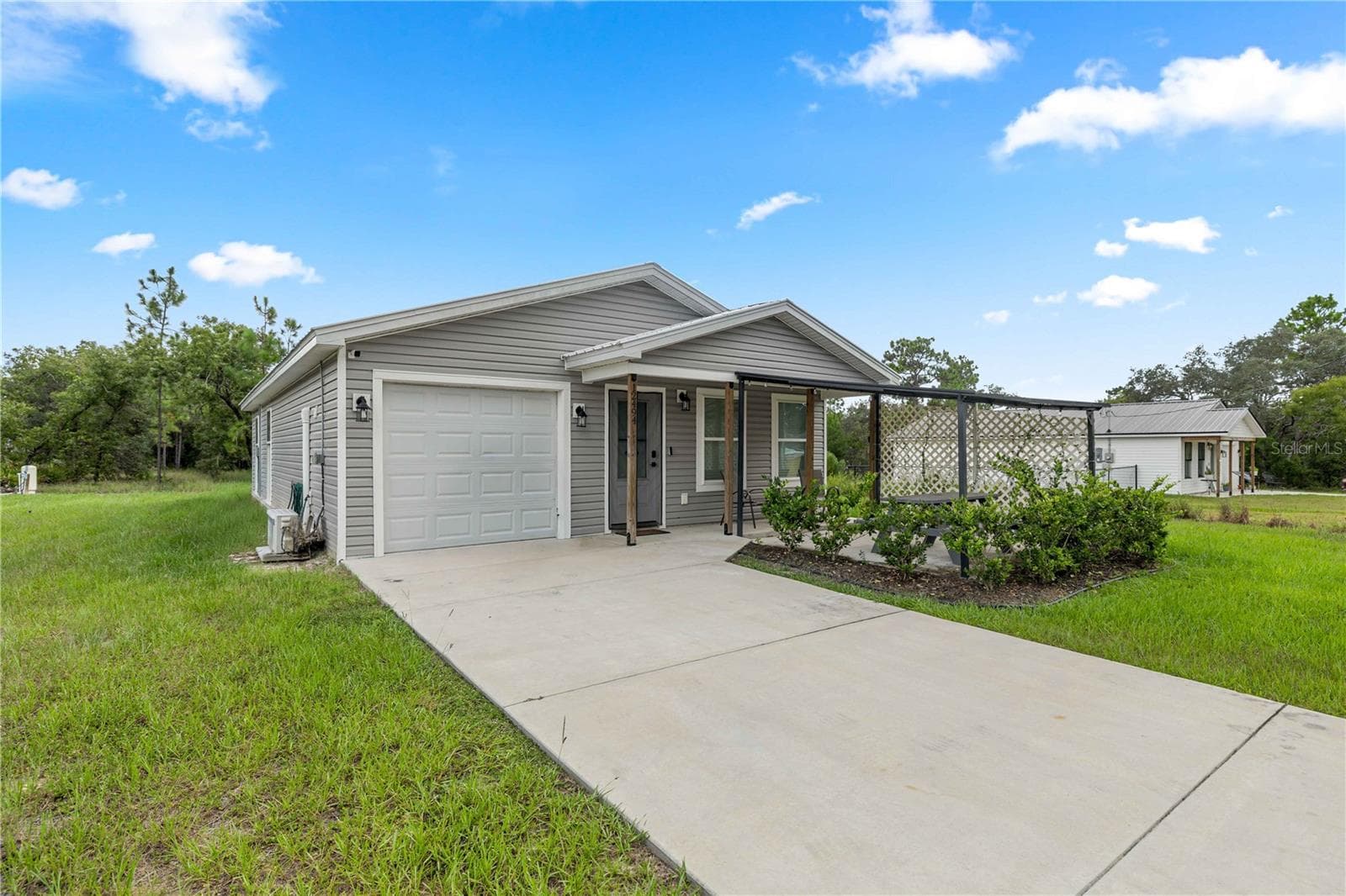 Single Family Residence at 12494 MOUNTAIN PLOVER RD, WEEKI WACHEE, photo 2 of 55