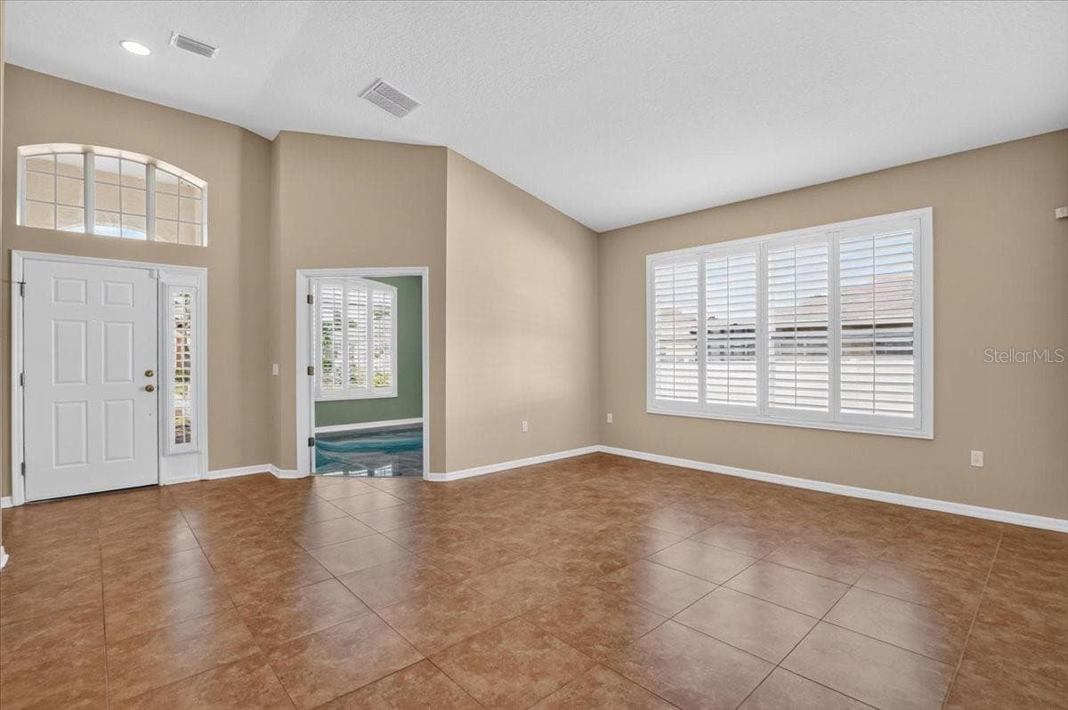 Entry way, Office, and living room - 2309 SWORDFISH AVE, HOLIDAY