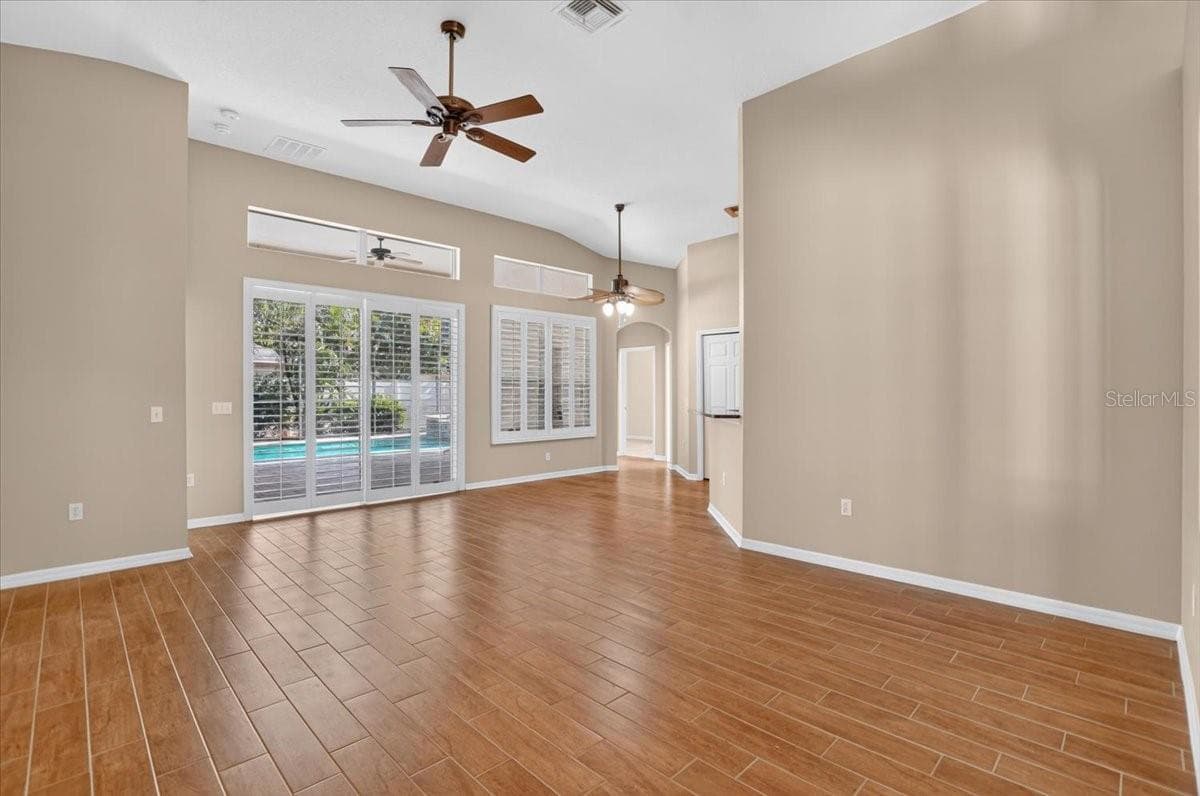 Family room looking towards salt wate pool - 2309 SWORDFISH AVE, HOLIDAY