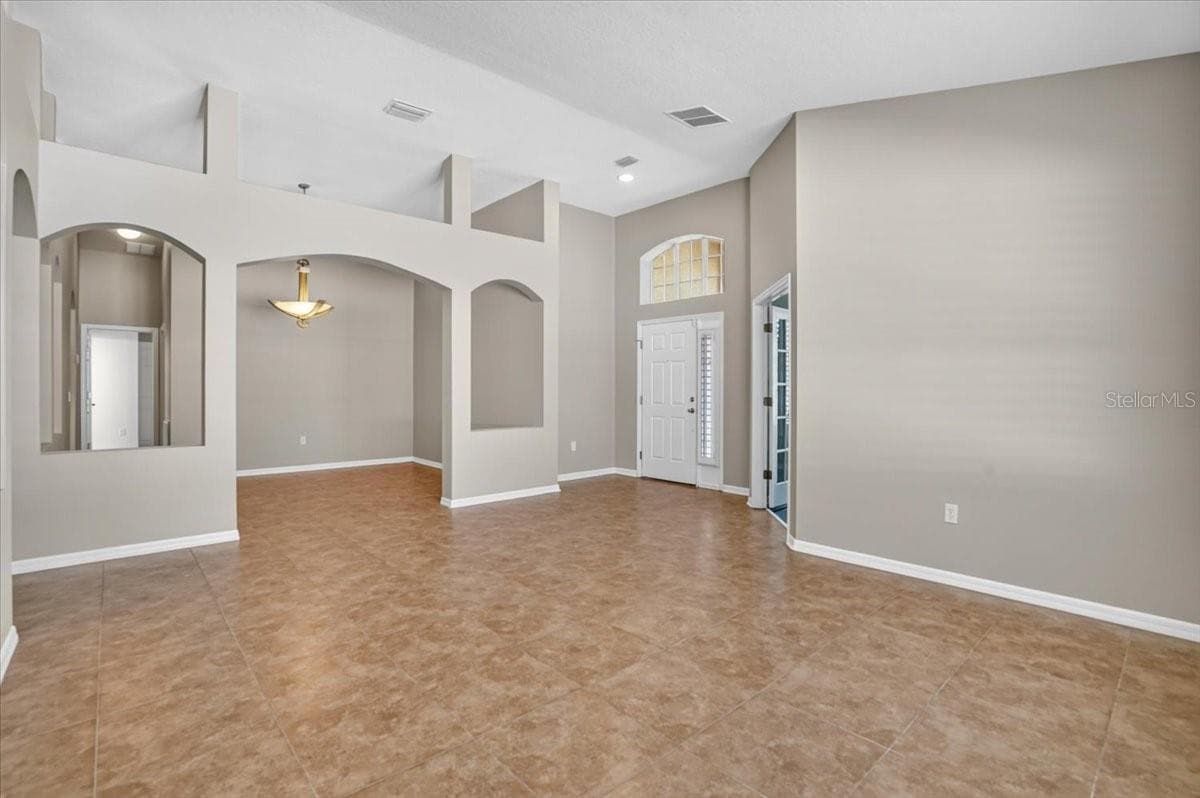 Living room looking towards dining room - 2309 SWORDFISH AVE, HOLIDAY