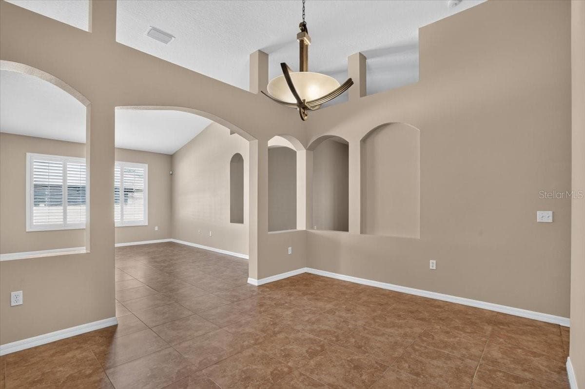 Dining room looking towards living room - 2309 SWORDFISH AVE, HOLIDAY