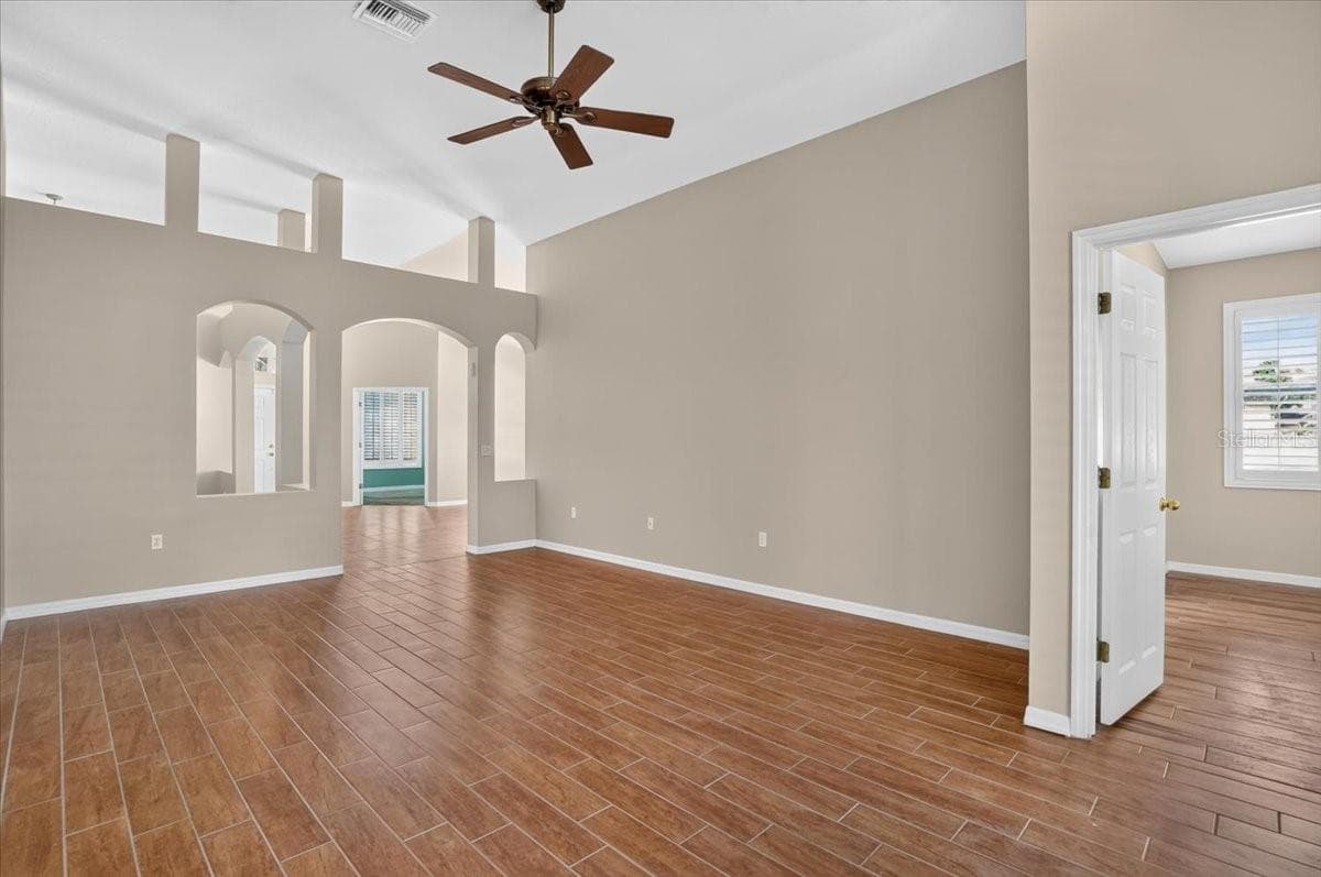 Family room looking towards office with master bedroom to the right - 2309 SWORDFISH AVE, HOLIDAY