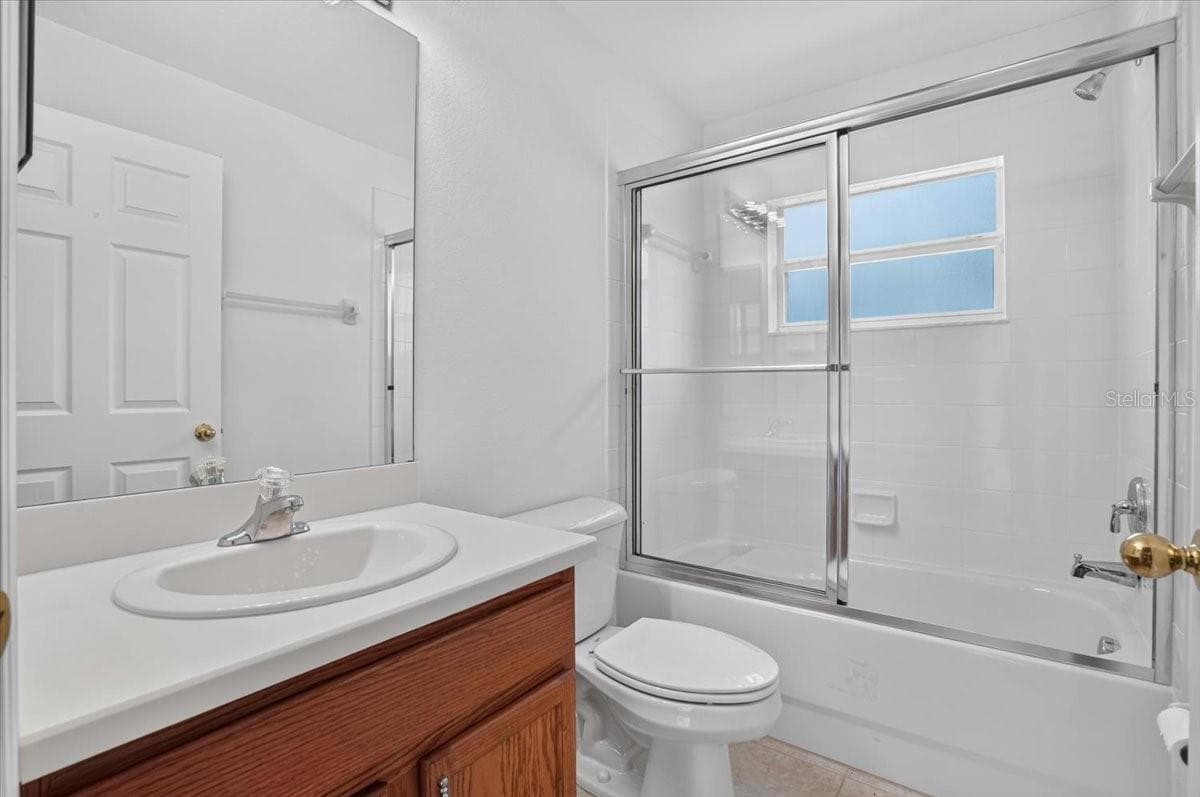 Bathroom 3 next to door out to pool - 2309 SWORDFISH AVE, HOLIDAY