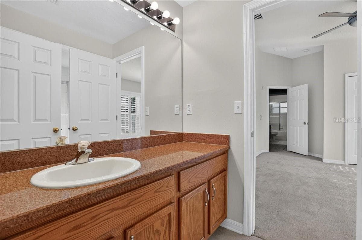 Jack and Jill bathroom 2 - 2309 SWORDFISH AVE, HOLIDAY