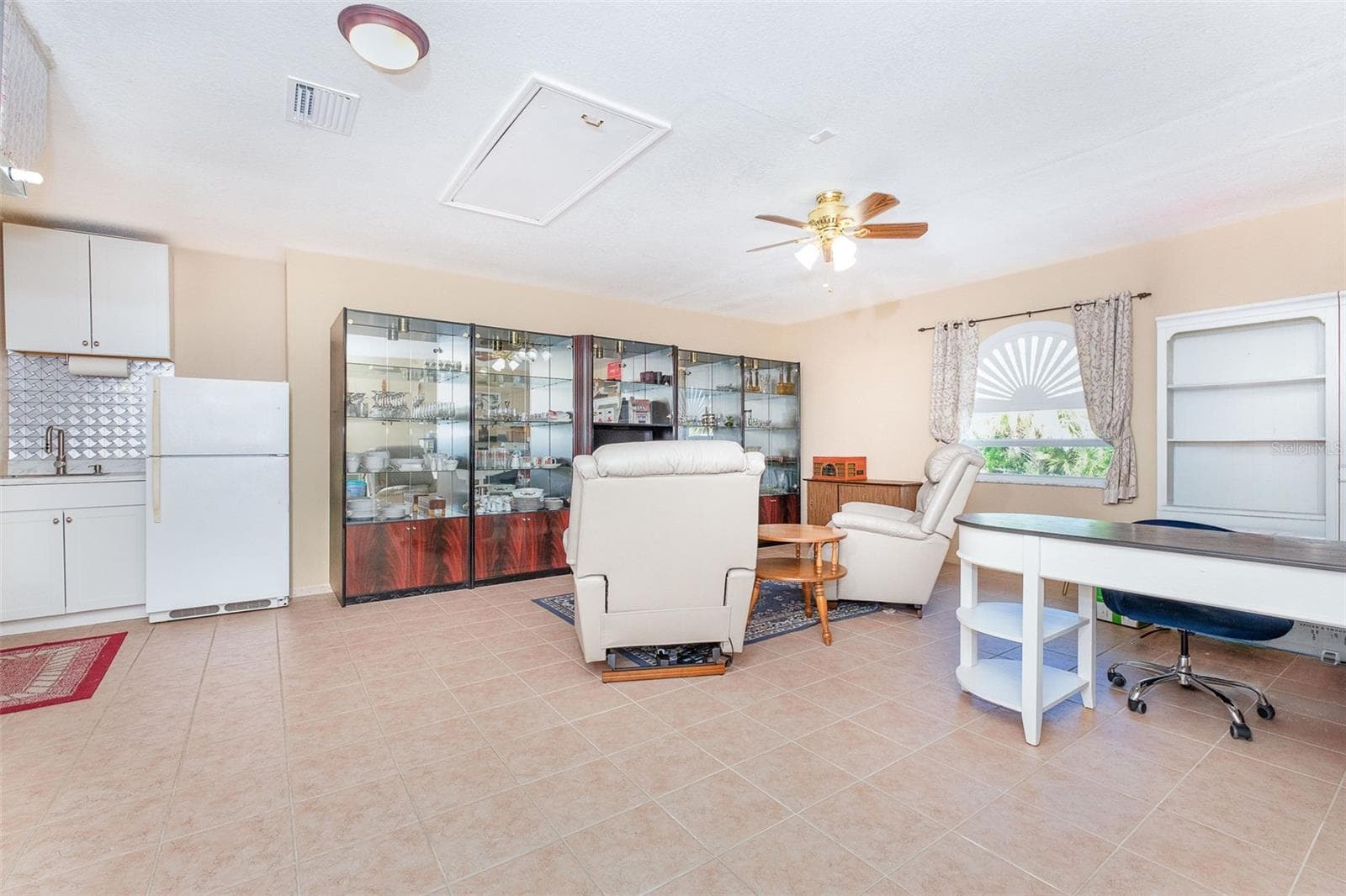Converted garage to large bonus room - 9296 ARRID CIR, PORT CHARLOTTE