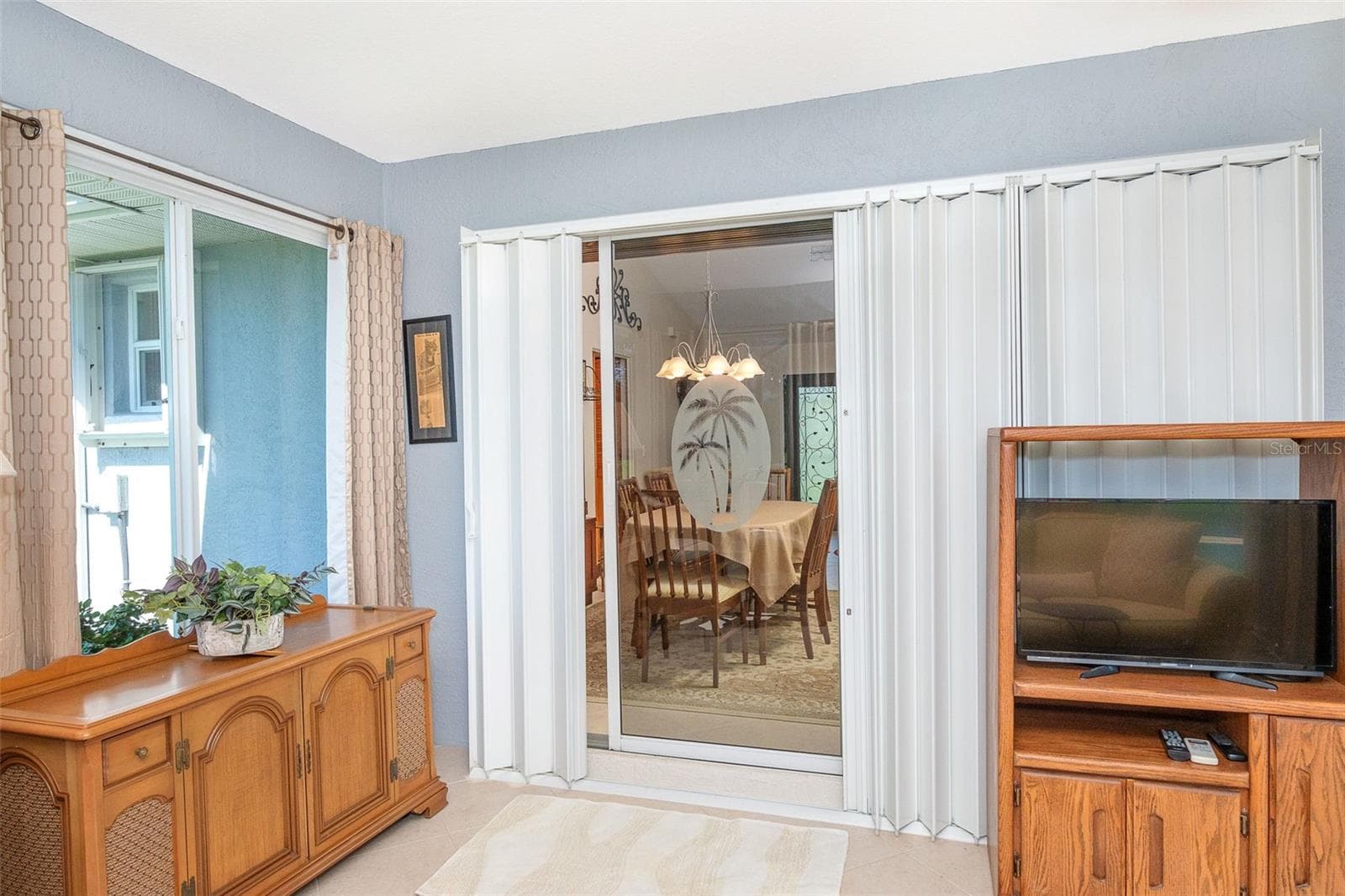 Hurricane shutters on FL room - 9296 ARRID CIR, PORT CHARLOTTE