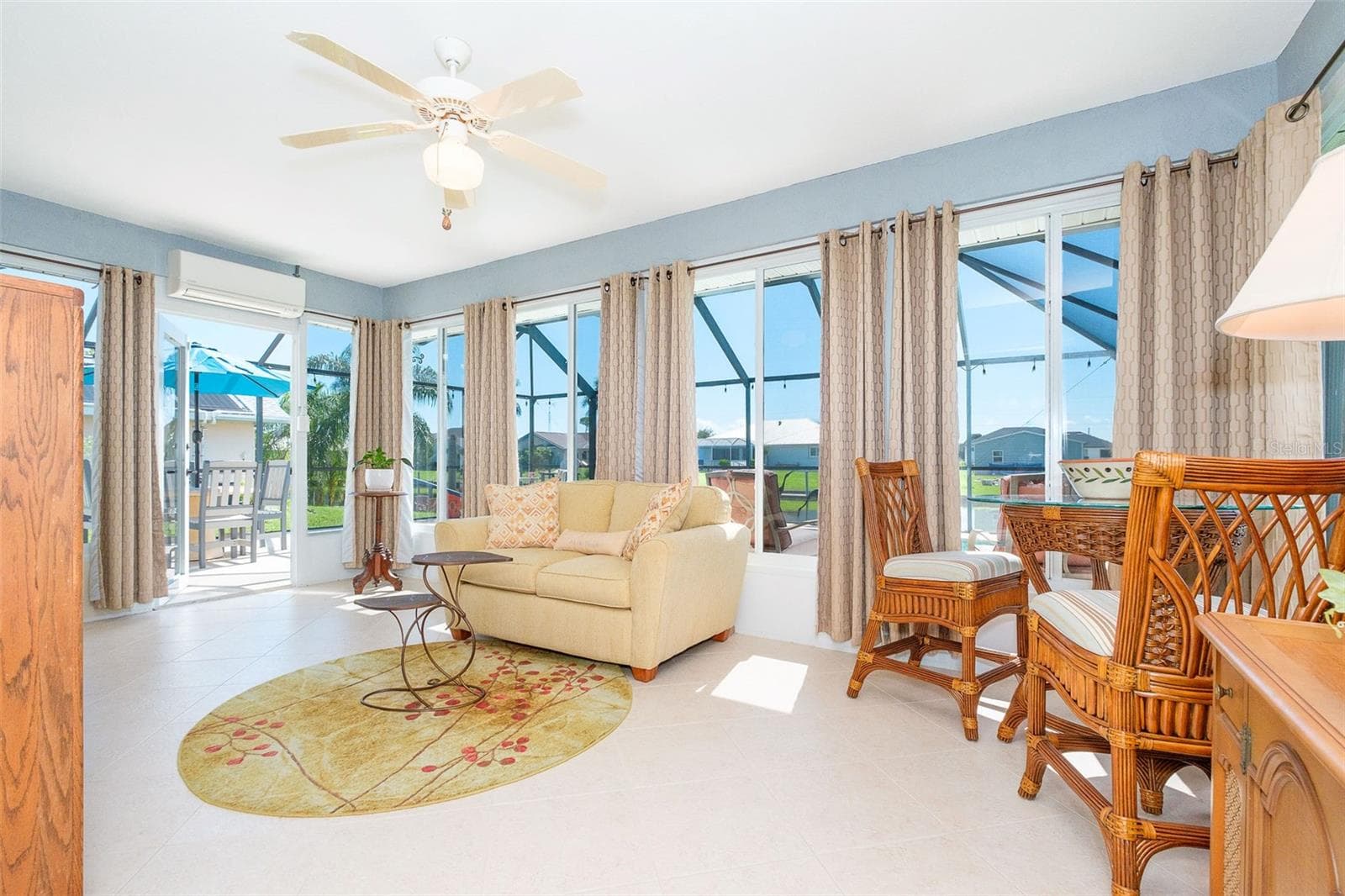FL room w/view of pool & canal - 9296 ARRID CIR, PORT CHARLOTTE