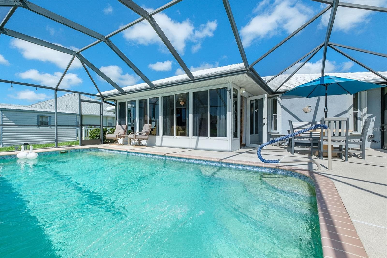 Room for everyone poolside! - 9296 ARRID CIR, PORT CHARLOTTE