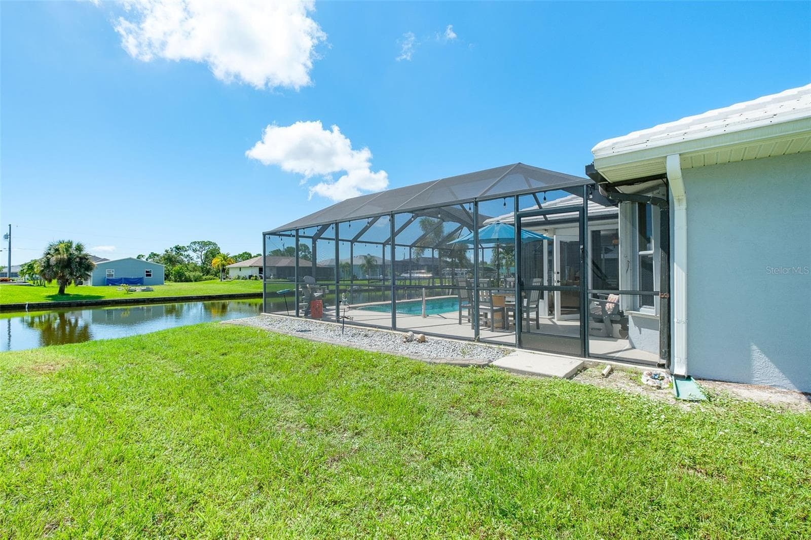 Screened lanai w/neat yard - 9296 ARRID CIR, PORT CHARLOTTE