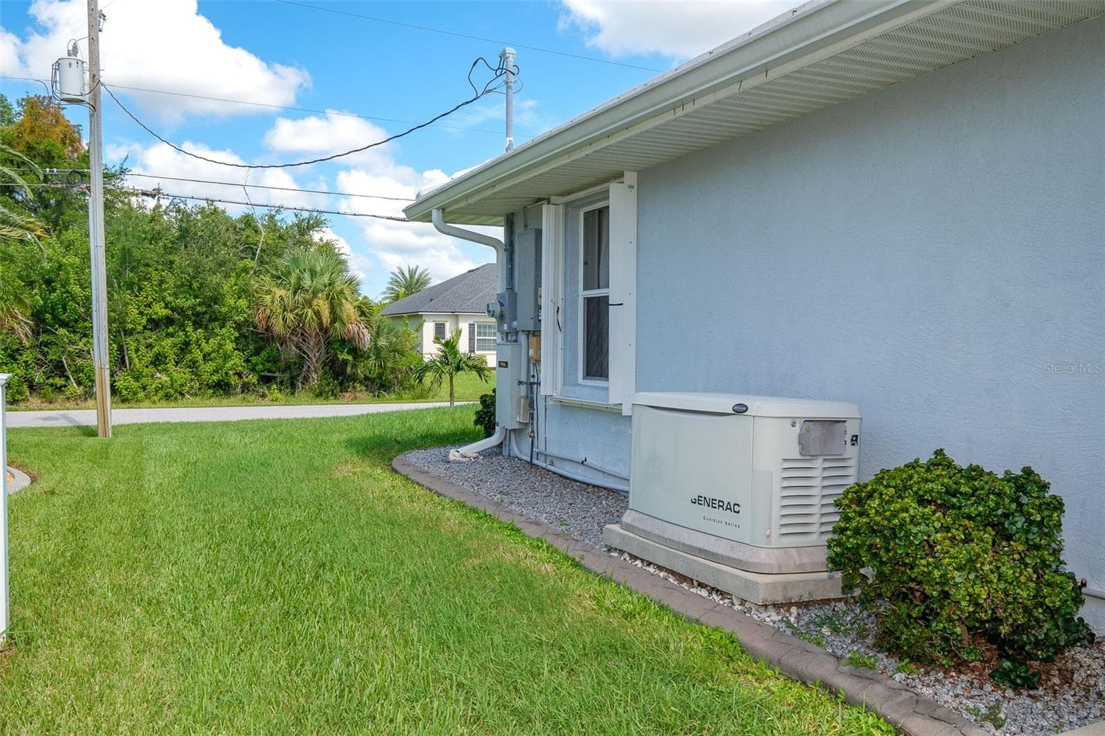 Generac generator w/buried propane tank - 9296 ARRID CIR, PORT CHARLOTTE