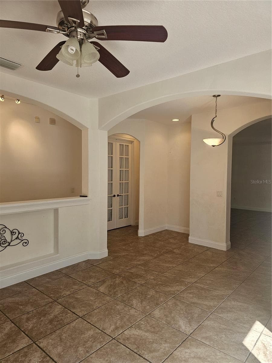 View from corner of dining room - 33116 IRONGATE DR, LEESBURG
