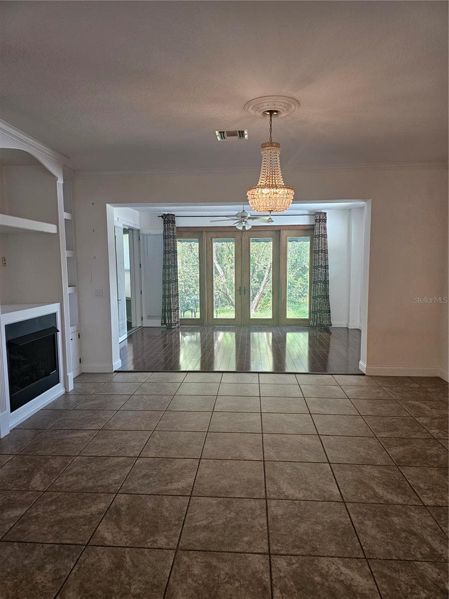 Family room with gas fire place - 33116 IRONGATE DR, LEESBURG