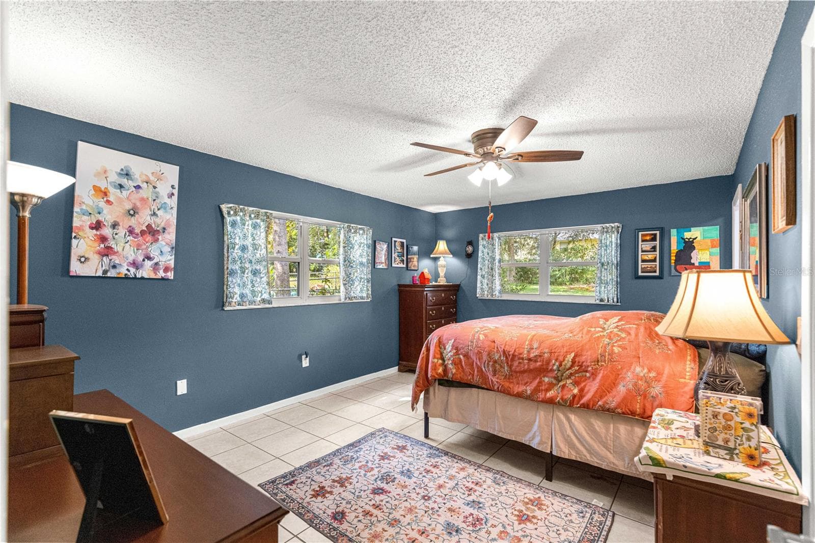 Another view of the primary bedroom and its tile flooring. - 2170 W DORAL CT, CITRUS SPRINGS