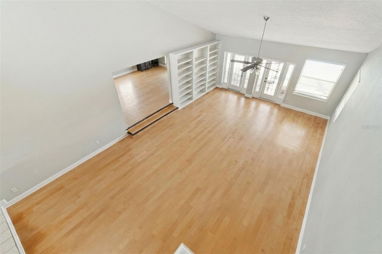 Overhead view of the family room looking down from entryway to upstairs area. - 25 LAKEWOOD CSWY, WINTER HAVEN