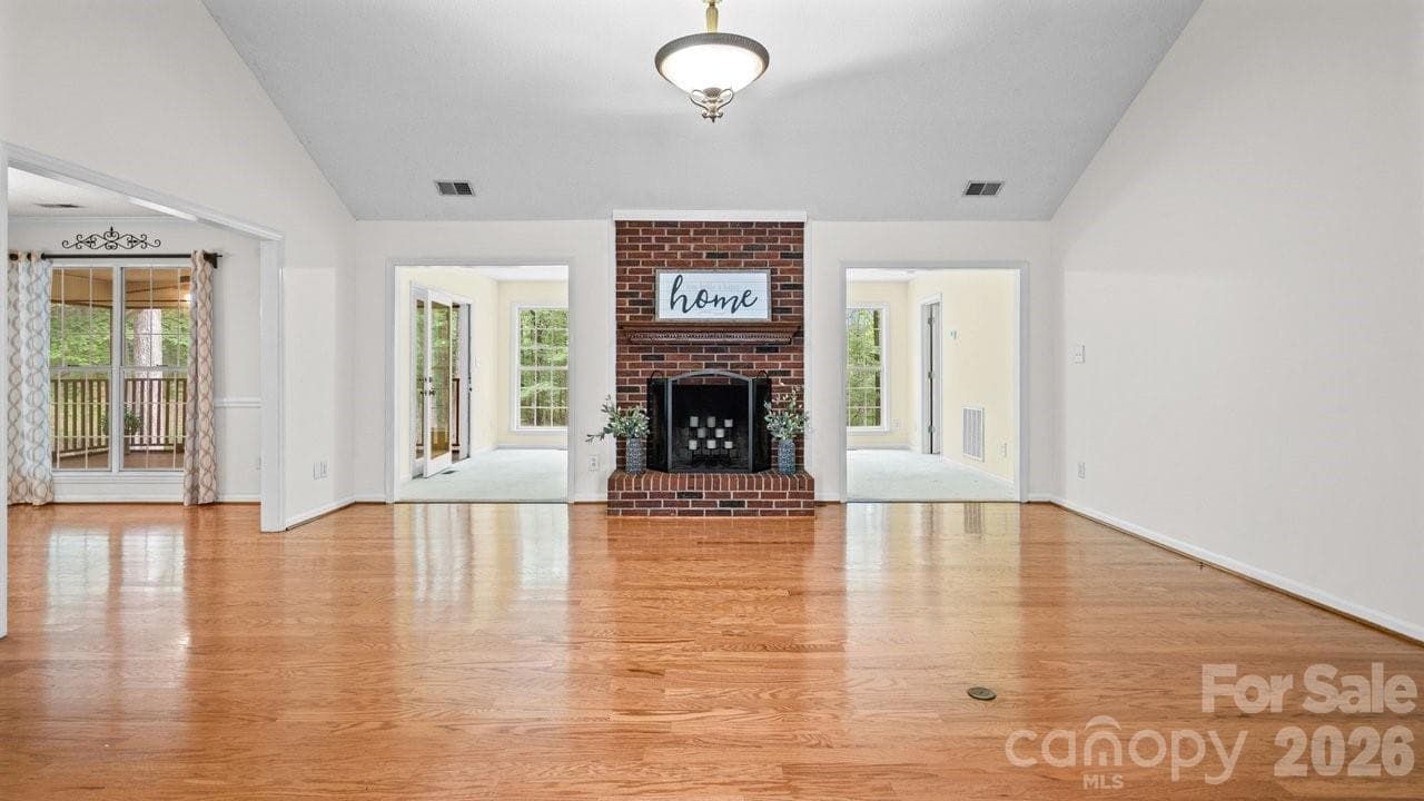Large family room with fireplace - 235 Withershinn Drive, Charlotte