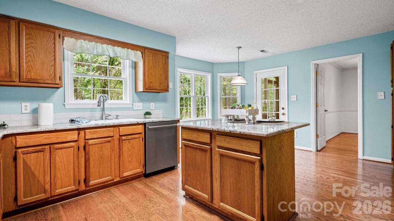 island for cooking and eating - 235 Withershinn Drive, Charlotte