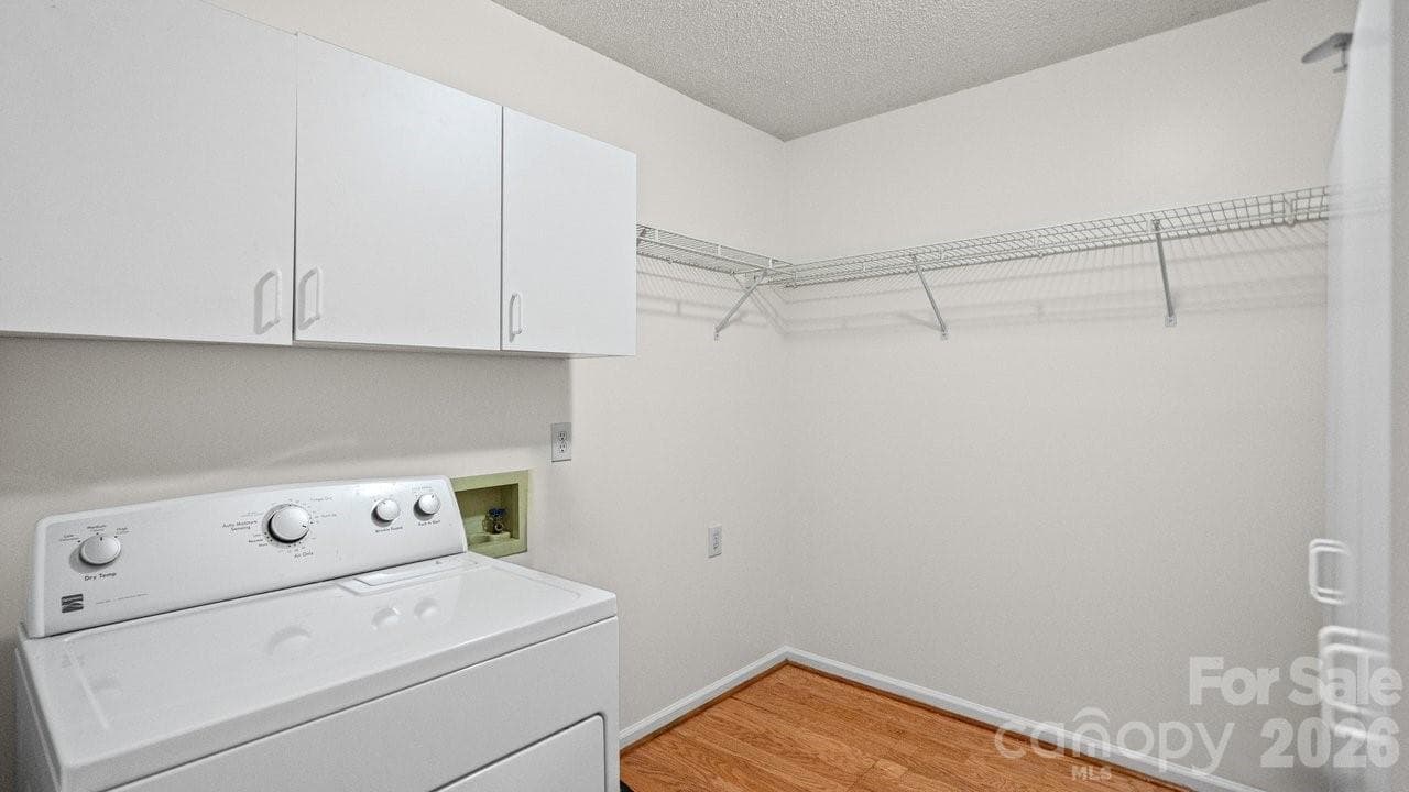 Laundry with dryer conveying/ shelves - 235 Withershinn Drive, Charlotte