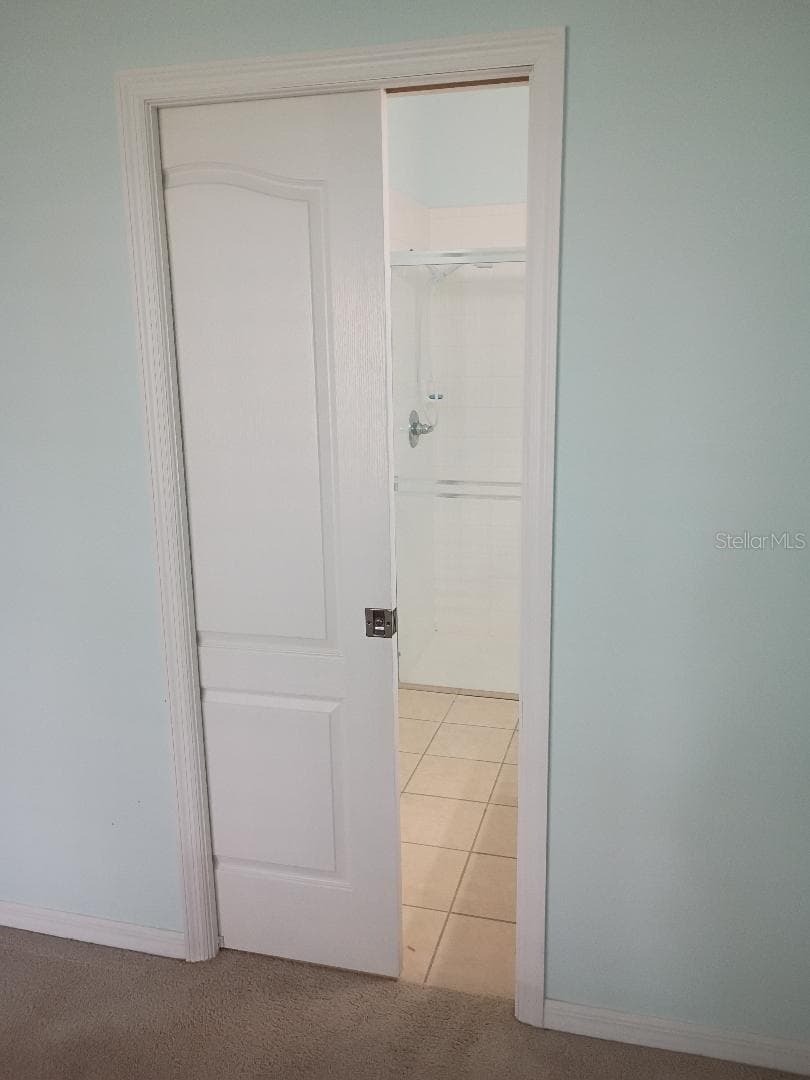 Owners Bathroom Pocket Door - 47 SUMMERWIND CIRCLE #95, PALM COAST