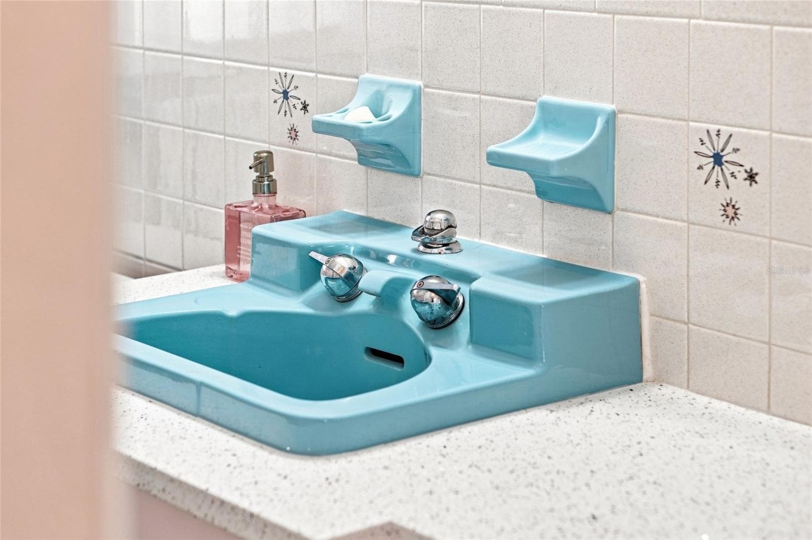 Crane sink set in new quartz with original vanity. - 1842 59TH WAY N, ST PETERSBURG