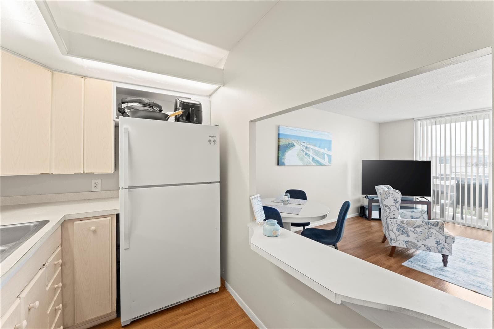 Kitchen and pass through - 2020 N ATLANTIC AVE #610N, COCOA BEACH