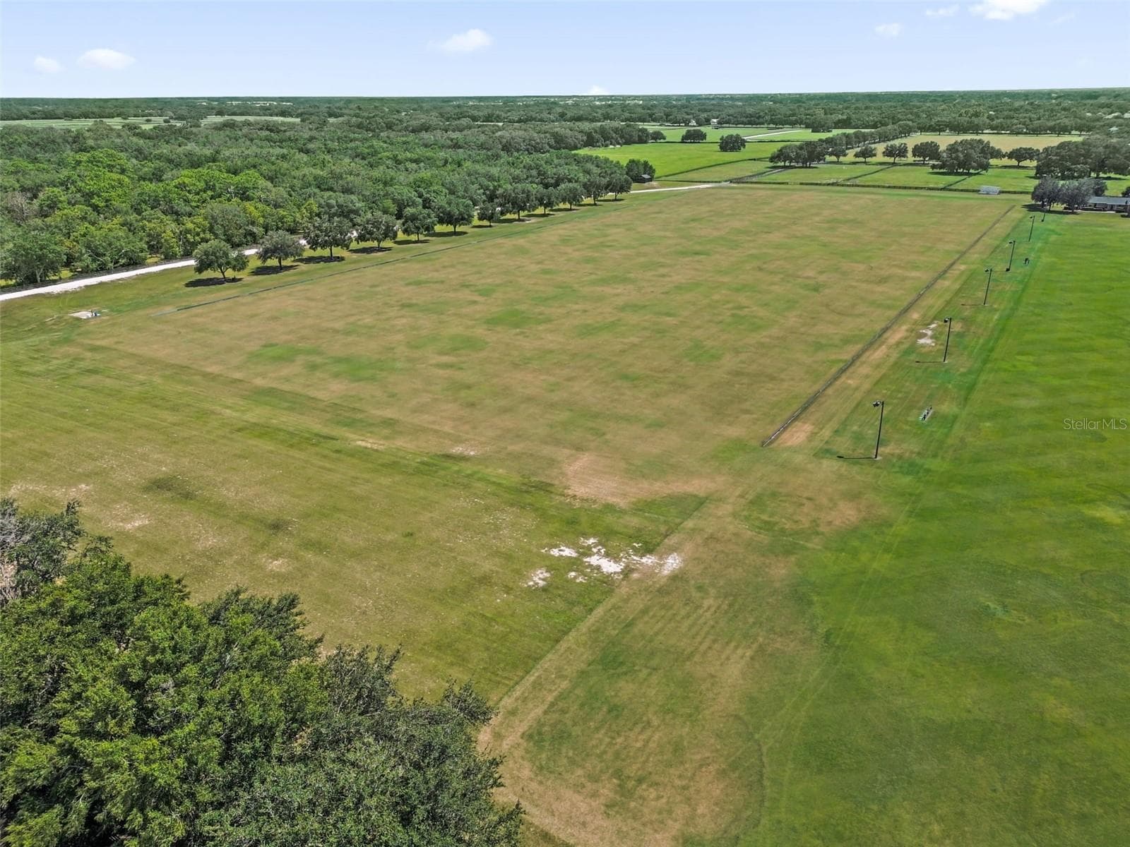 Drone of the polo field behind - 2801 BARBOZA DR, THE VILLAGES