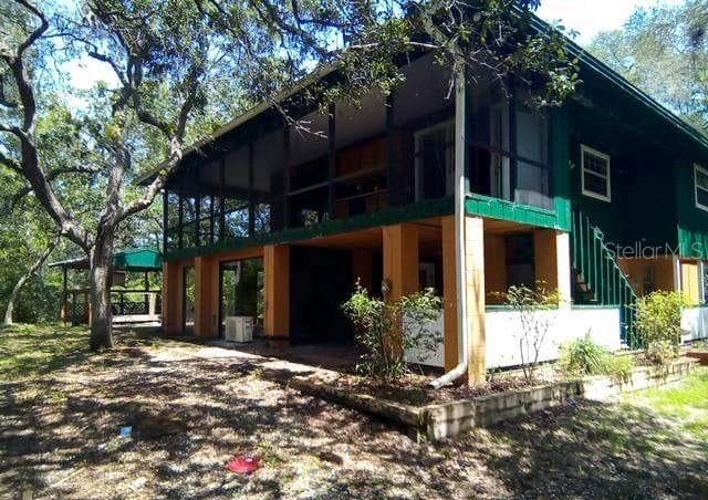Single Family Residence at 3339 E WITHLACOOCHEE TRL, DUNNELLON, photo 2 of 34