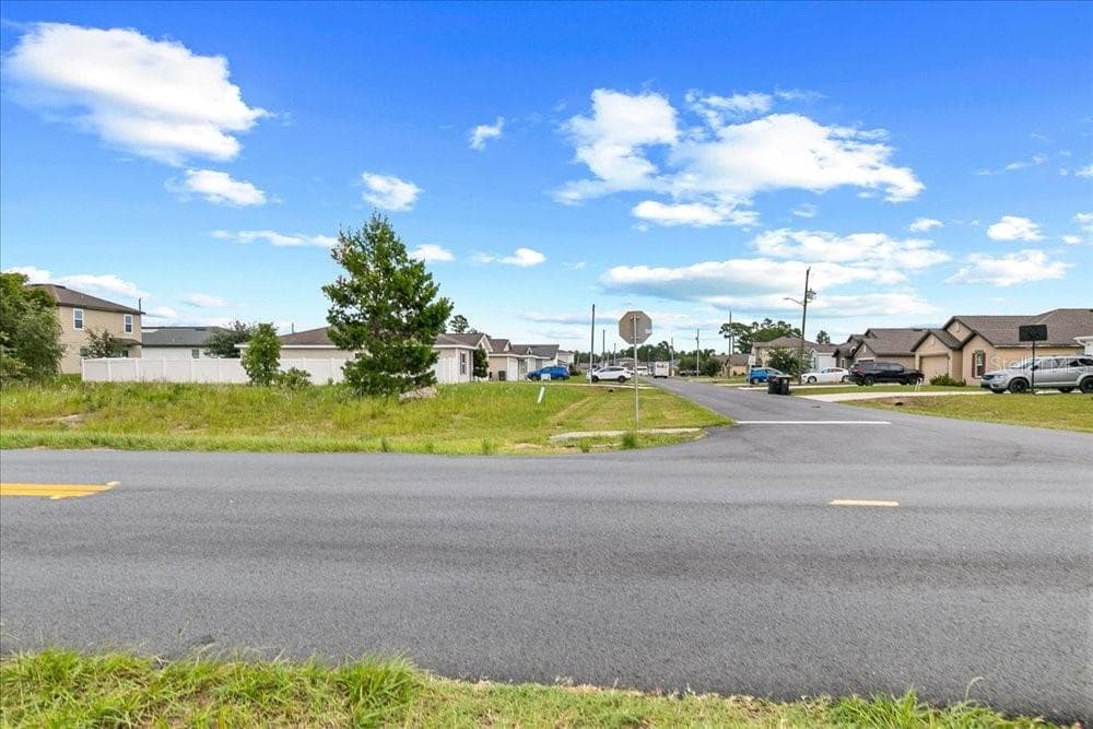 Street-Level View of Vacant Lot and Surrounding Neighborhood - 284 FIG CT, POINCIANA