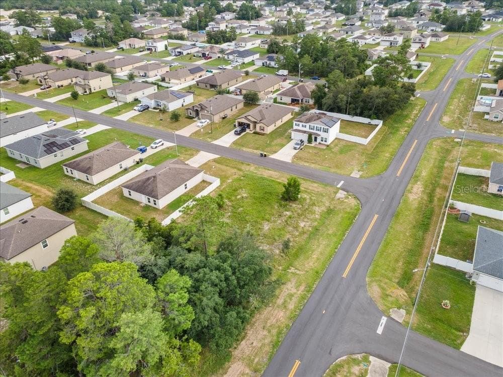 Close Aerial View Showing Vacant Lot and Surrounding Neighborhood - 284 FIG CT, POINCIANA