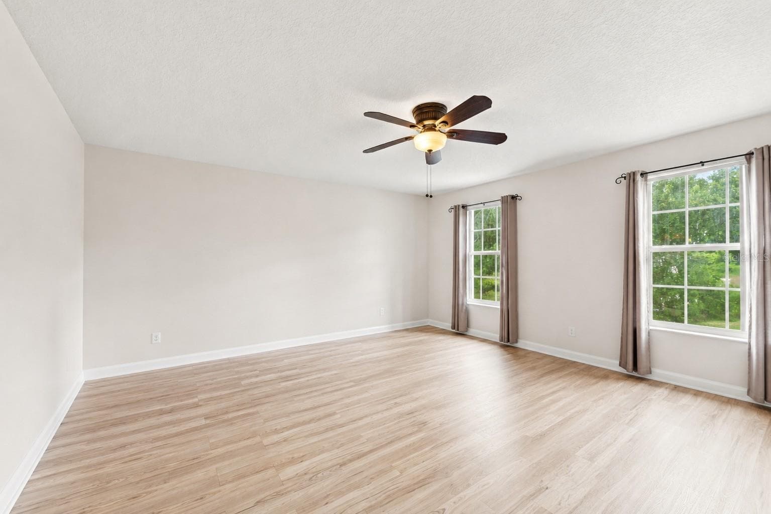 Primary Bedroom - AI Enhanced - 611 ABACO CT, KISSIMMEE