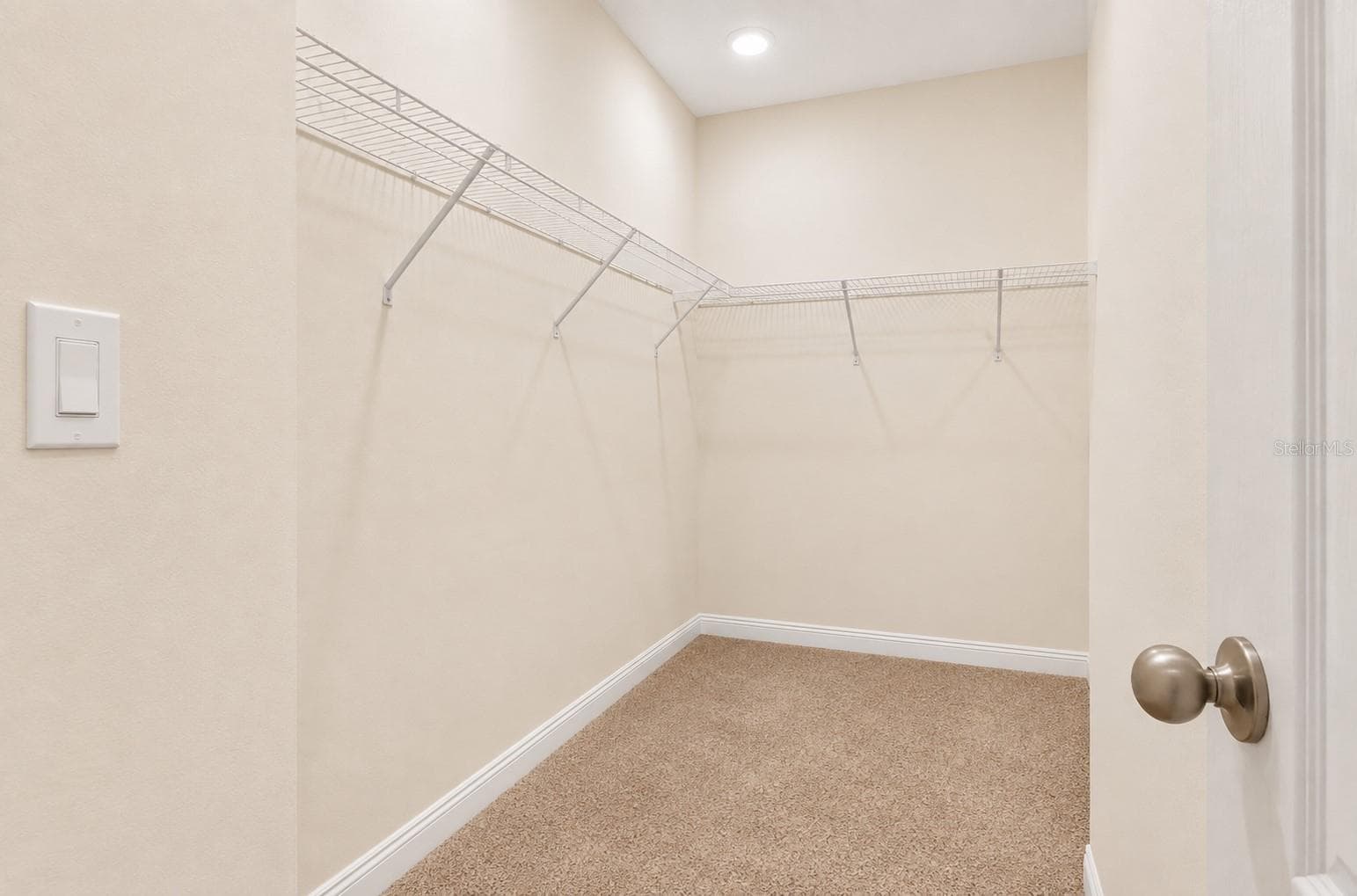 Primary bedroom walk-in closet - 1021 SILVERBELL TRL, ST CLOUD