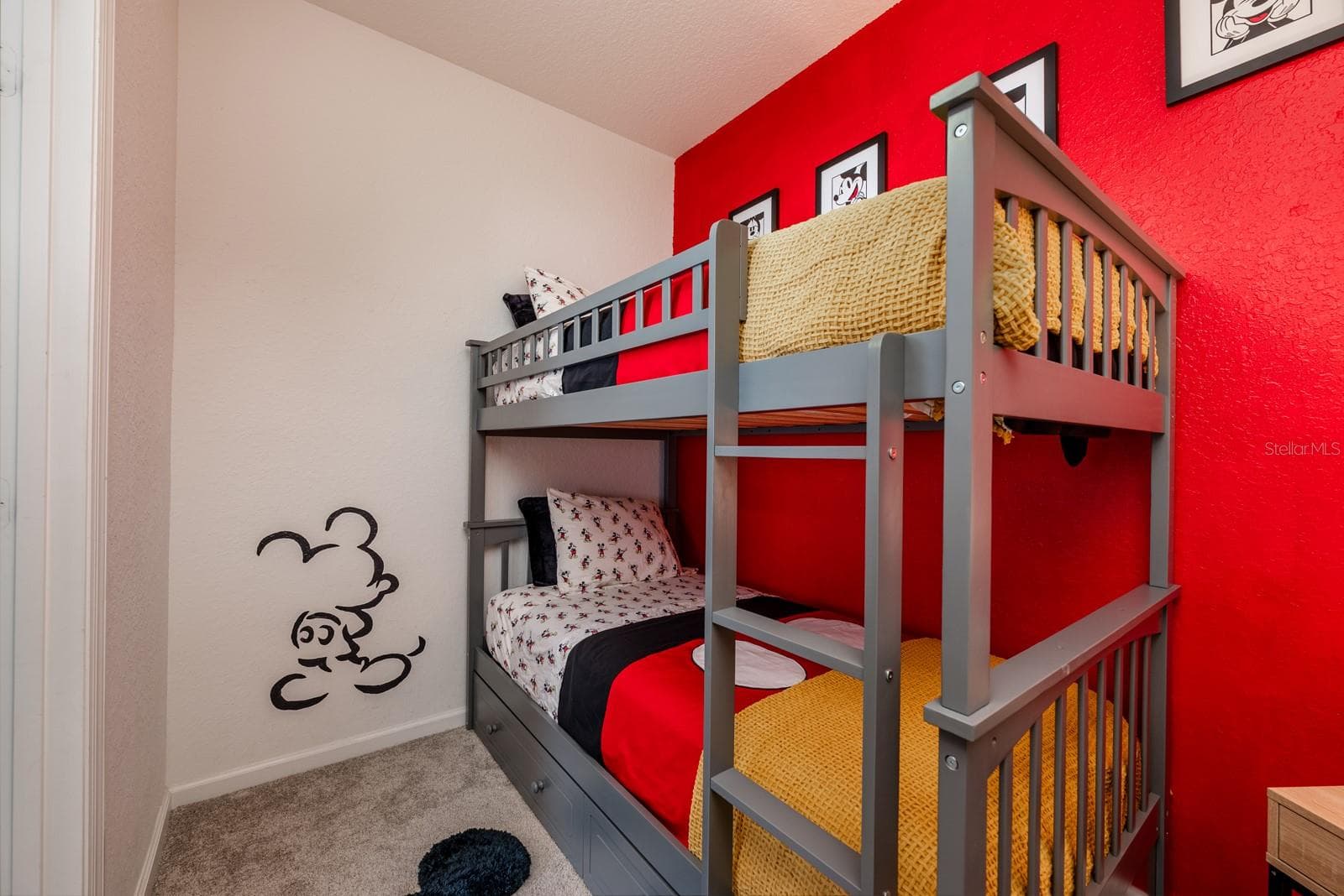 This bunk room is a bold and colorful nod to Mickey, and a cozy space for the kids to sleep and play! - 2778 ALMATON LOOP #204, KISSIMMEE