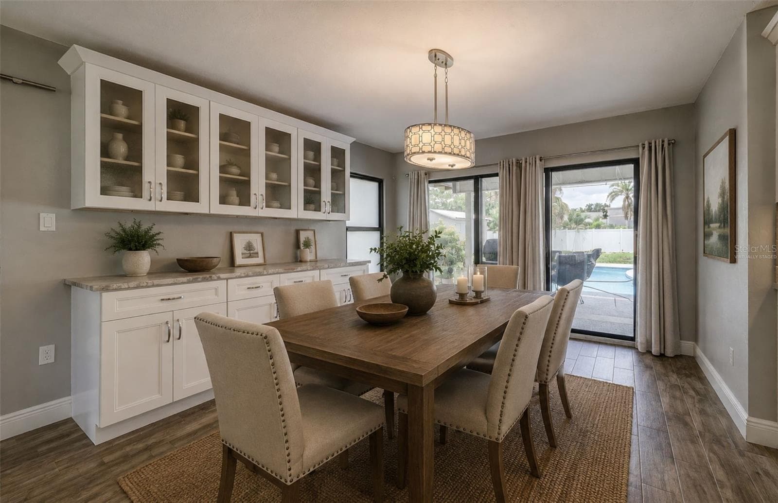 virtually staged dining room - 323 SUWANEE AVE, SARASOTA