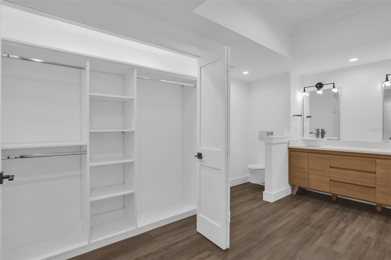 Primary Bath with Two Custom Closets with Built-ins - 7593 GATHERING DR #707, REUNION