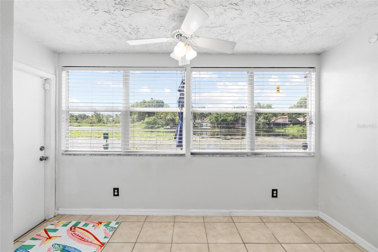 Enclosed former Lanai offers an additional 76 sq ft space. - 4038 CORTEZ DR #B, TAMPA