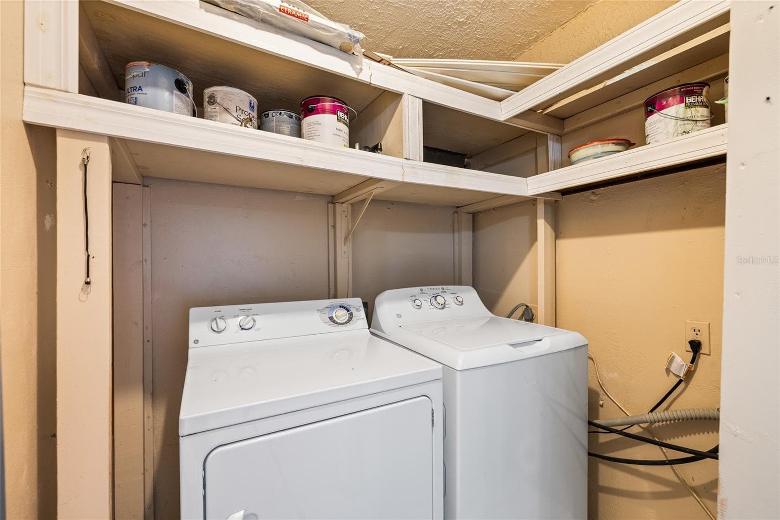 Inside laundry room with storage. - 4038 CORTEZ DR #B, TAMPA
