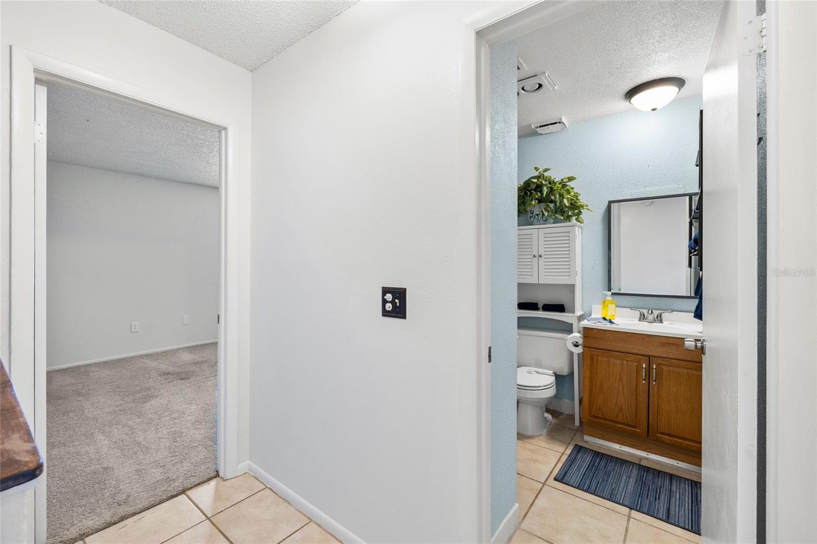 Full bath at the top of the stairs.  Second bedroom to the left of the bath. - 4038 CORTEZ DR #B, TAMPA