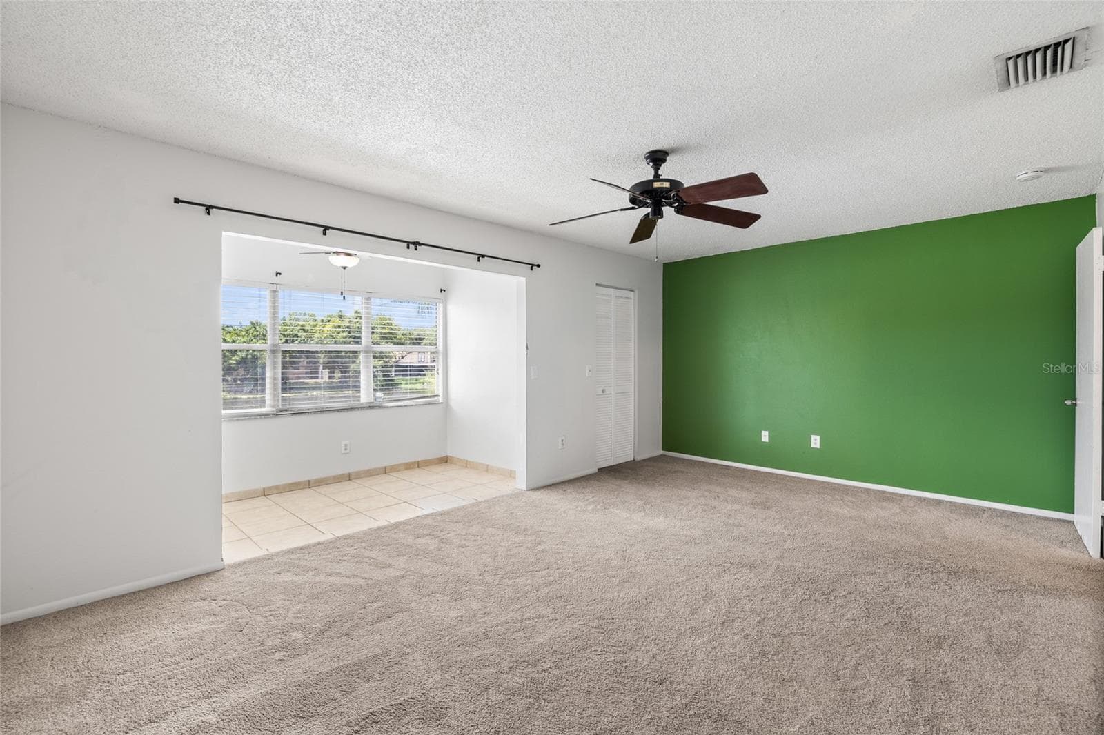 Primary bedroom and extra space - 4038 CORTEZ DR #B, TAMPA