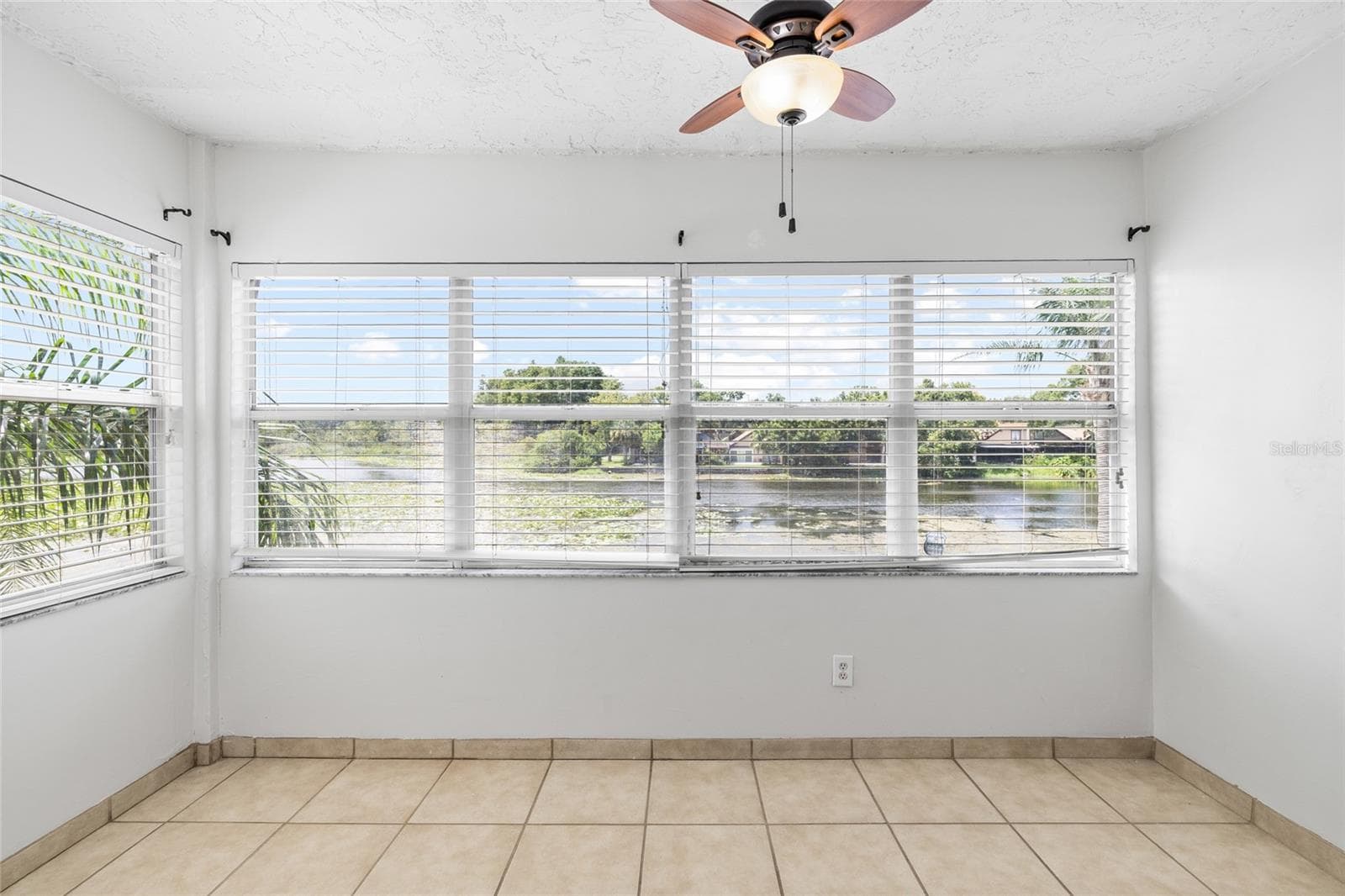Beautiful lighting and view from the side room. - 4038 CORTEZ DR #B, TAMPA