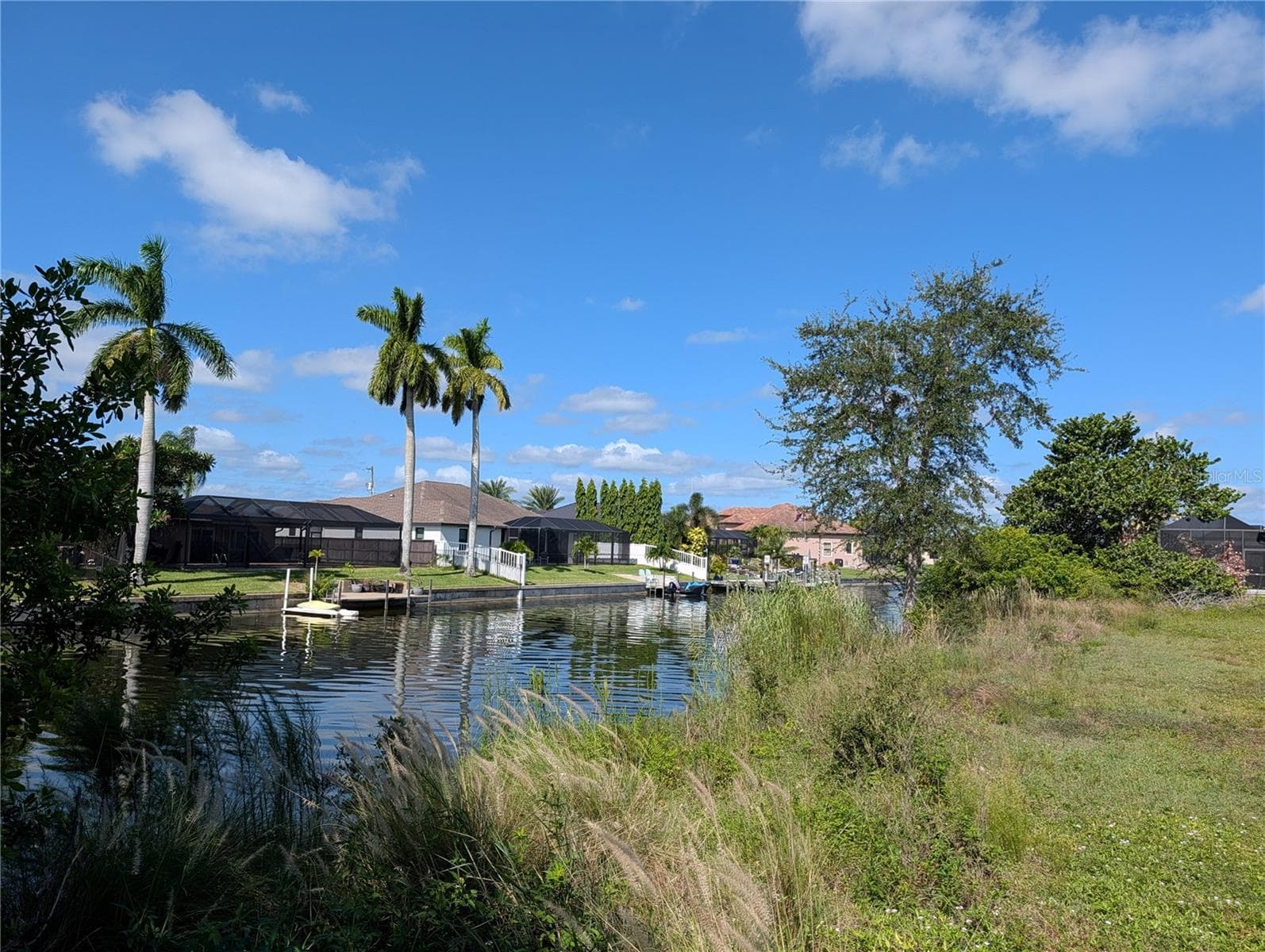 Canal on rear of lot. - 216 SW 12TH ST, CAPE CORAL