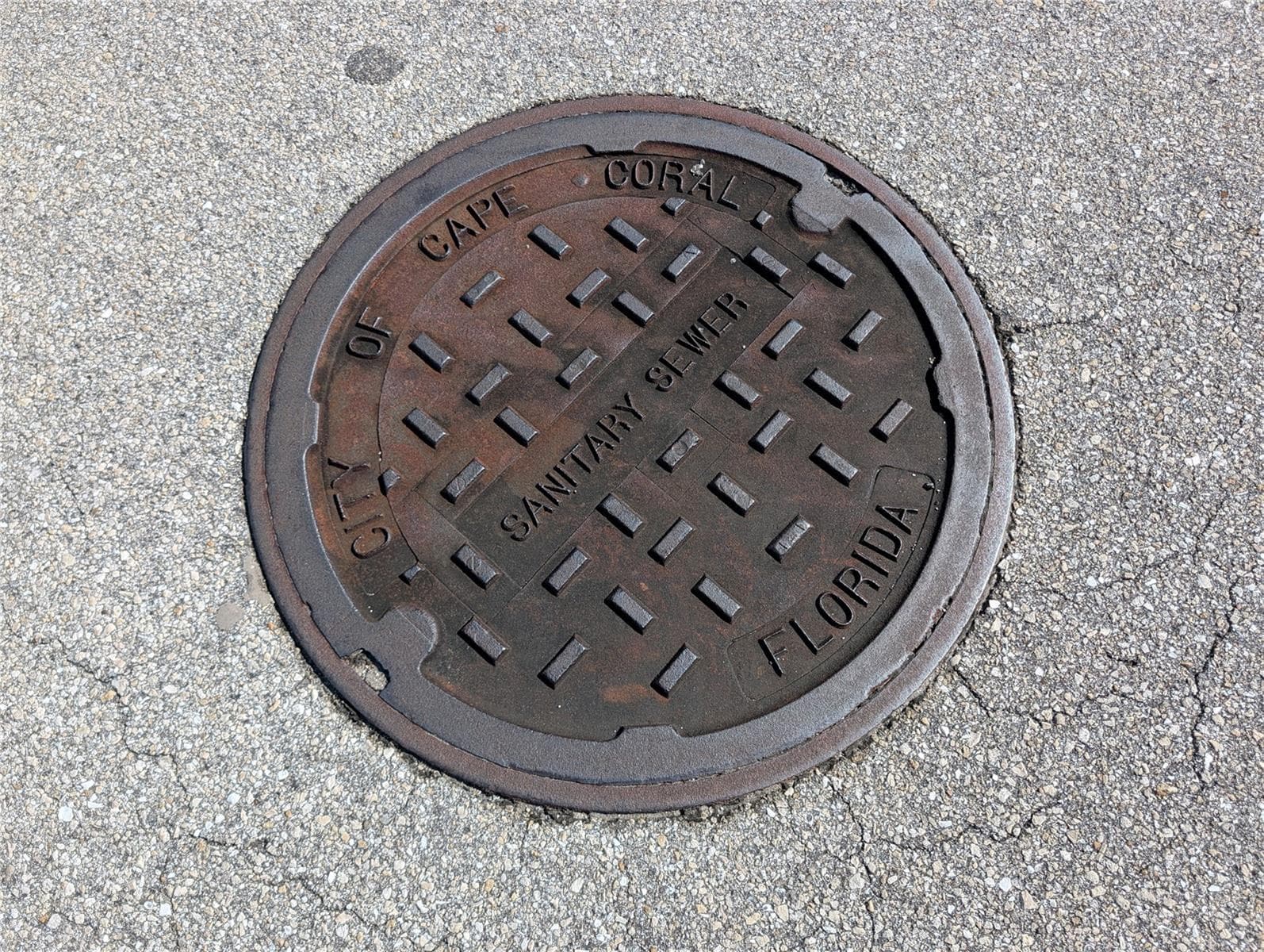 Public sewer available. Runs under street with access in front of lot. - 216 SW 12TH ST, CAPE CORAL