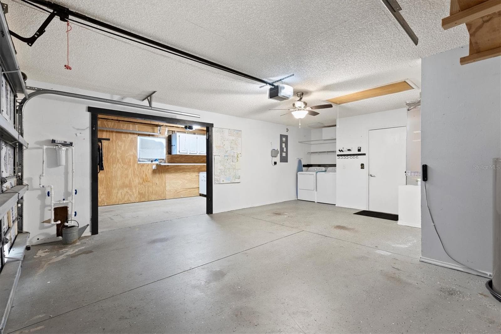 GARAGE, THIS AREA WITH A 1 1/2 GARAGE WITH OTHER GARAGE THROUGH OPENING - 1426 JUAREZ PL, THE VILLAGES
