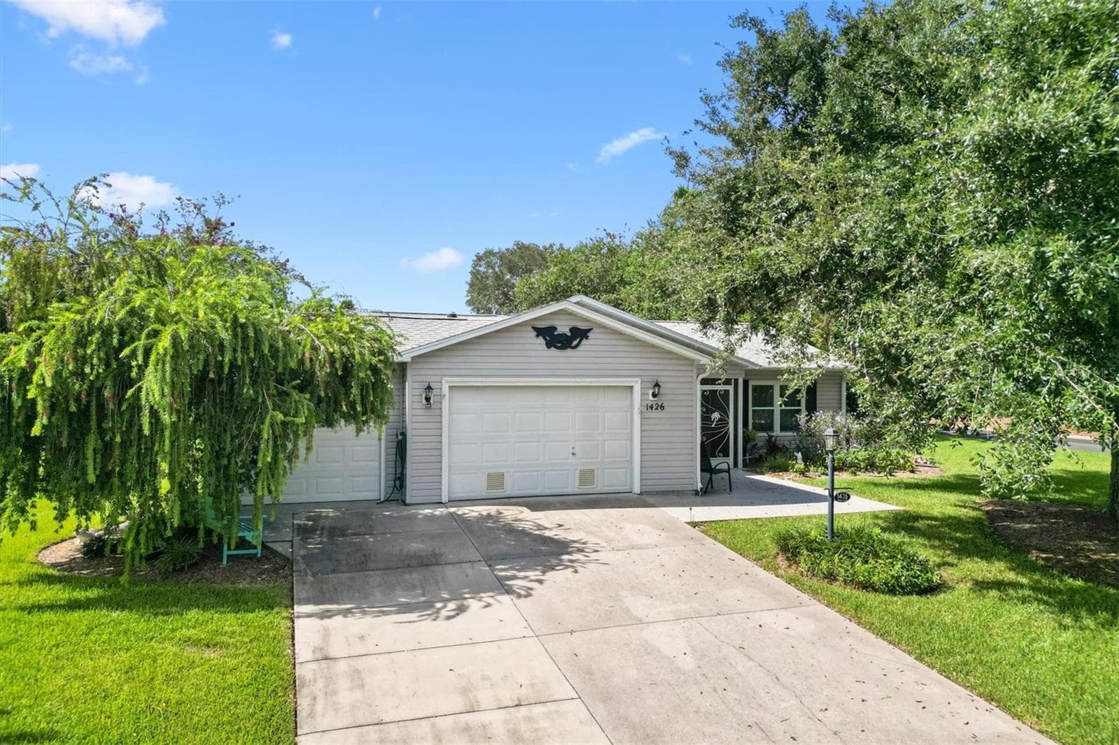 HOME WITH 2 1/2 CAR GARAGE AND OUTSIDE PATIO - 1426 JUAREZ PL, THE VILLAGES