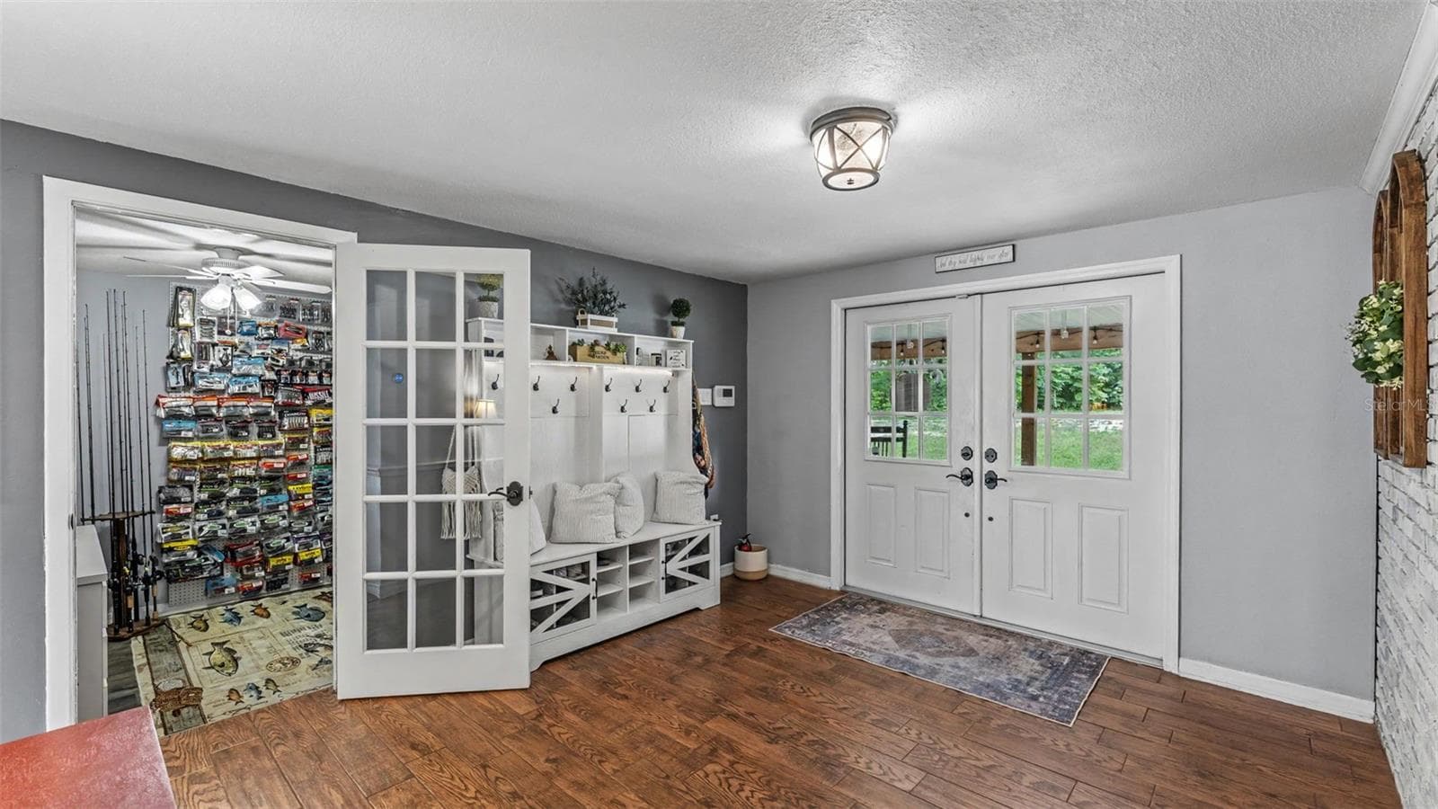 Front door, entry way. Bonus room connected to primary on the left - 2406 LAKE ELLA RD, FRUITLAND PARK