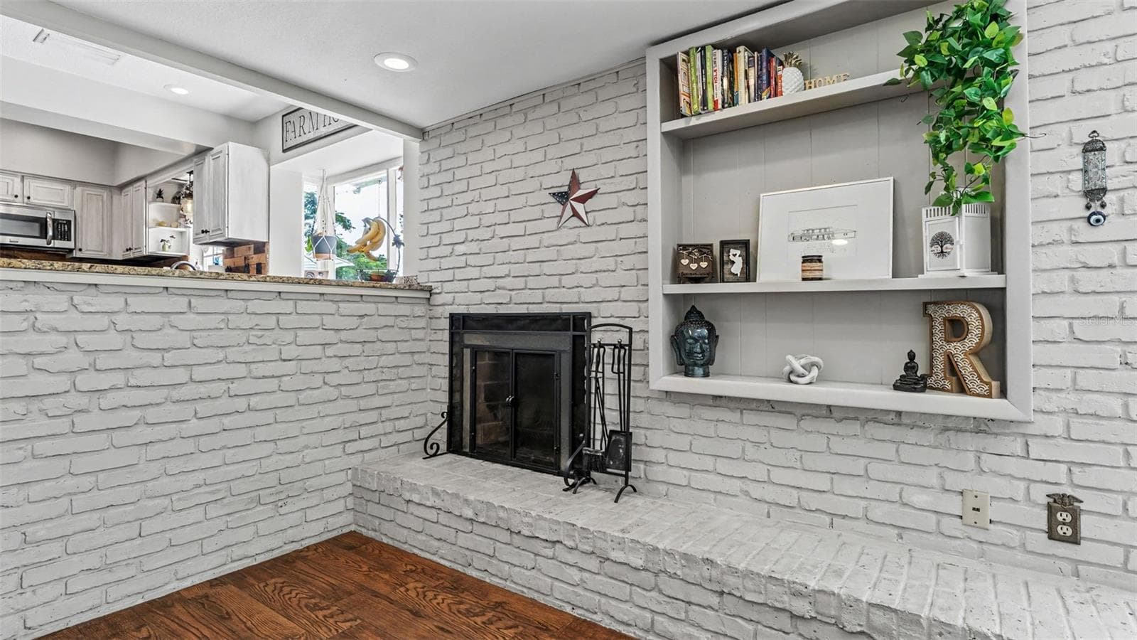 wood burning fireplace - 2406 LAKE ELLA RD, FRUITLAND PARK