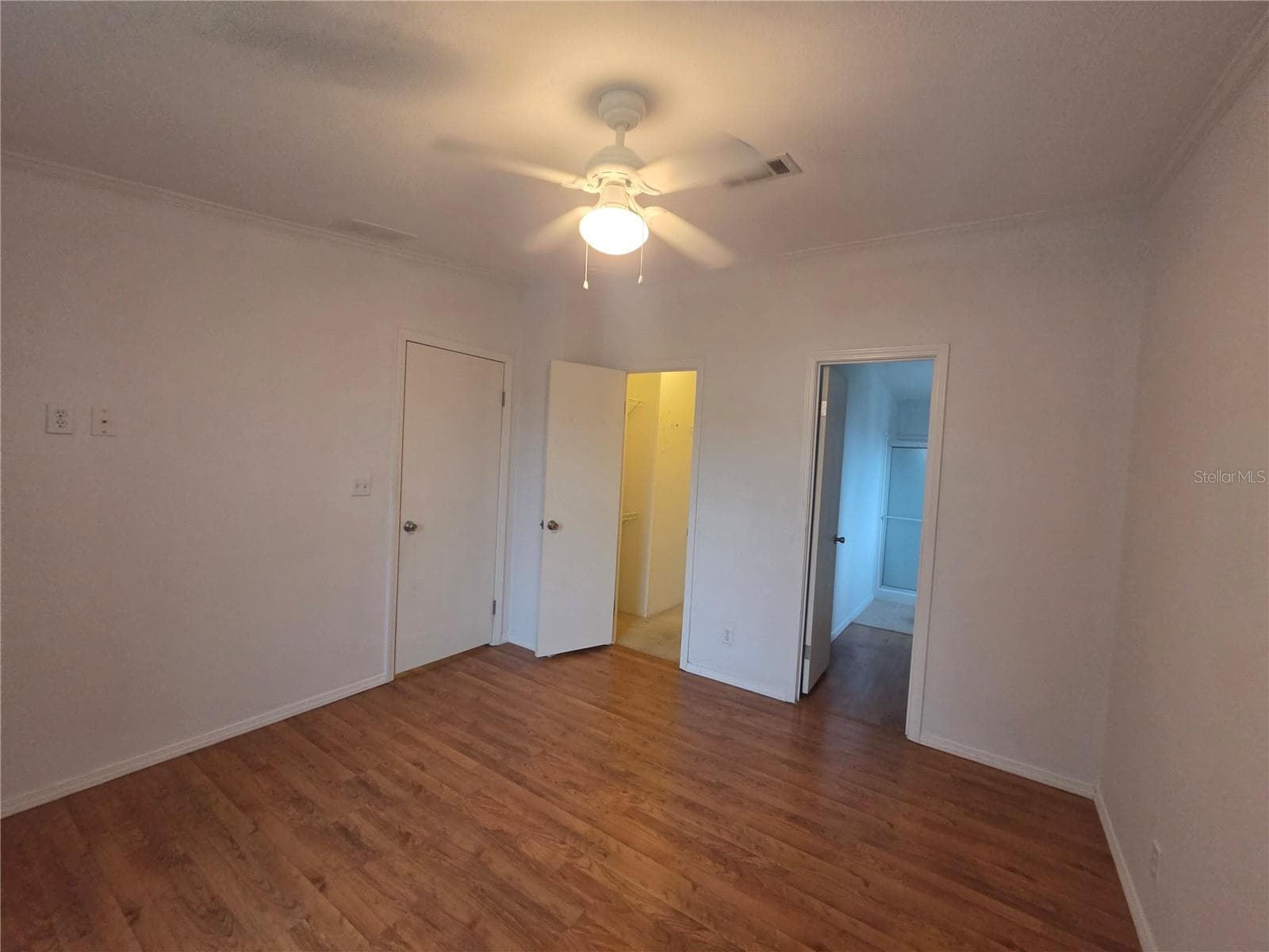 Primary Bedroom with walkin closet and ensuite Bath - 213 YORK COTTAGE DR, HAINES CITY